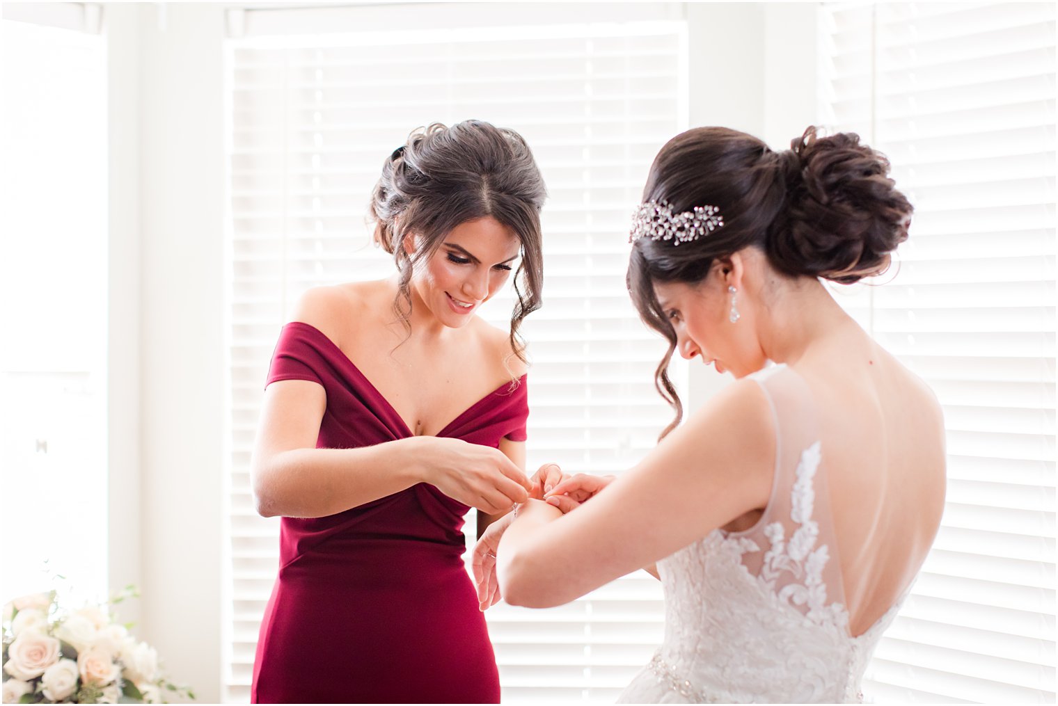 bride prepares for wedding day with Idalia Photography