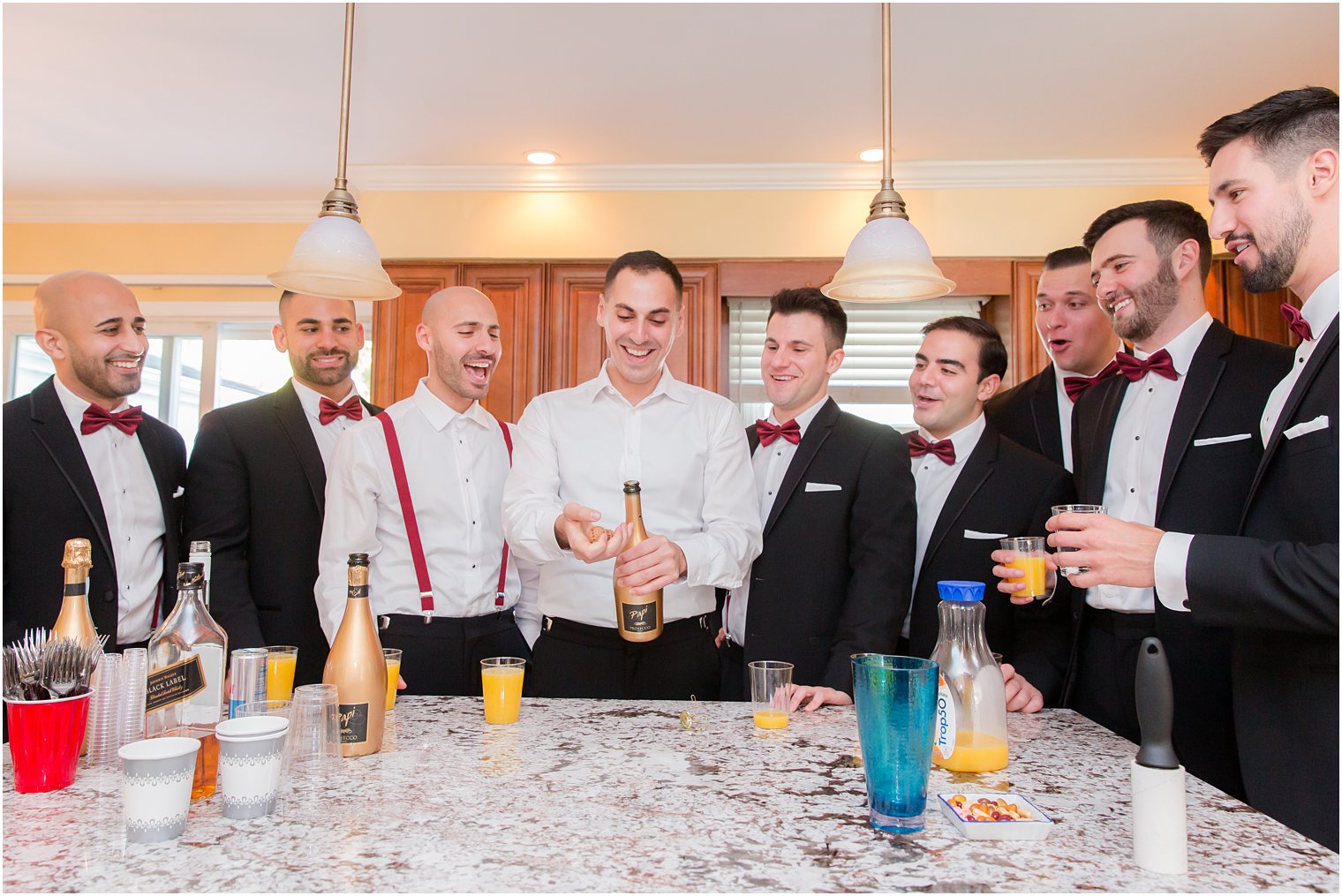 groom and groomsmen toast wedding morning with Idalia Photography