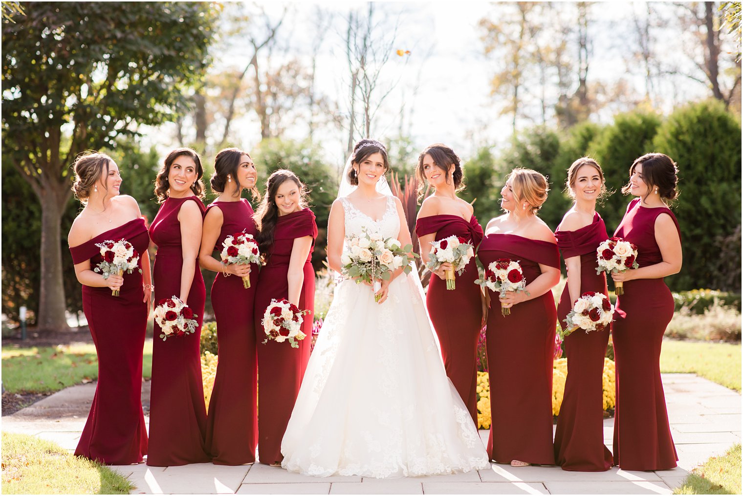burgundy bridesmaid gowns for fall wedding with Idalia Photography