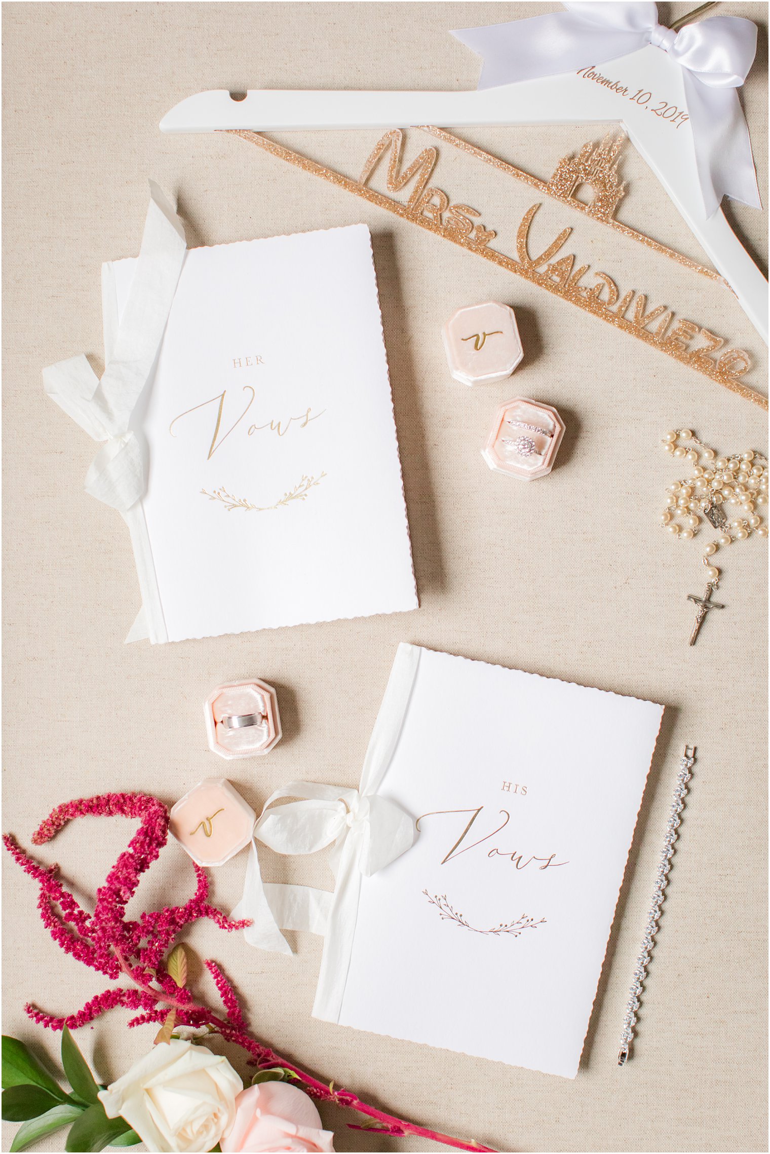 gold and ivory vow booklets for NJ wedding photographed by Idalia Photography