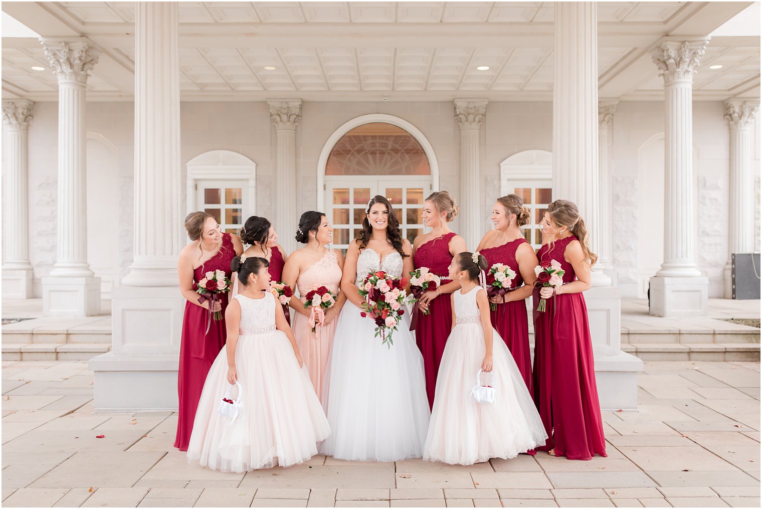 bride and bridesmaids pose at the Palace at Somerset Park 