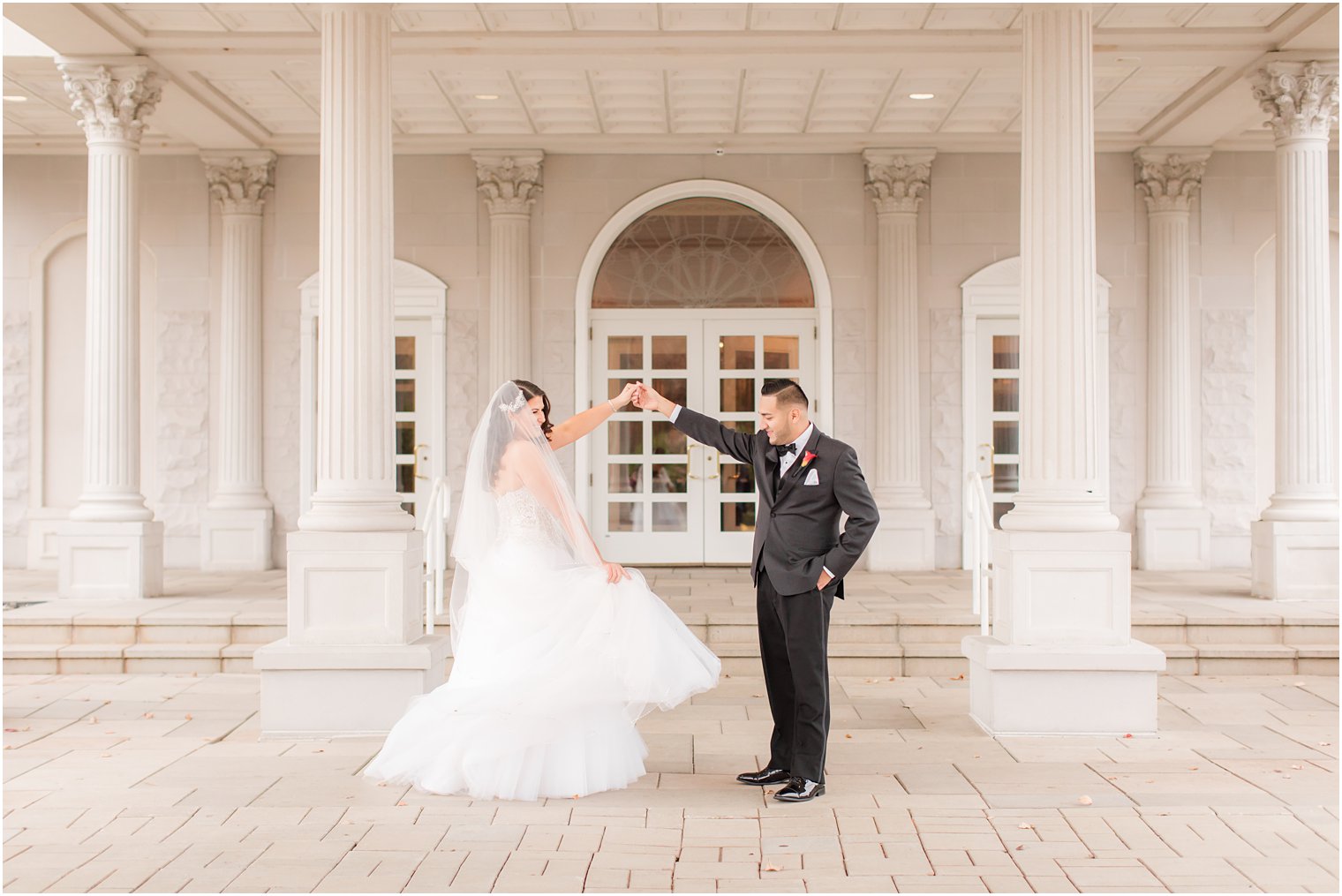 bride and groom portraits outside the Palace at Somerset Park