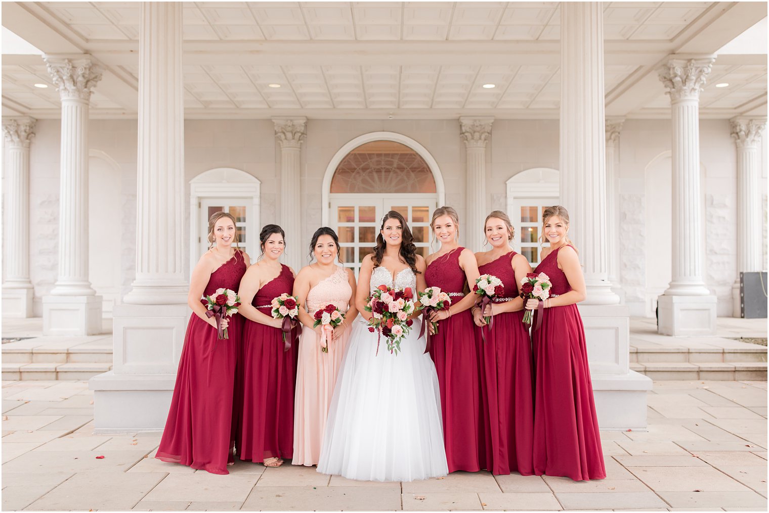 burgundy bridesmaid gowns photographed by Idalia Photography