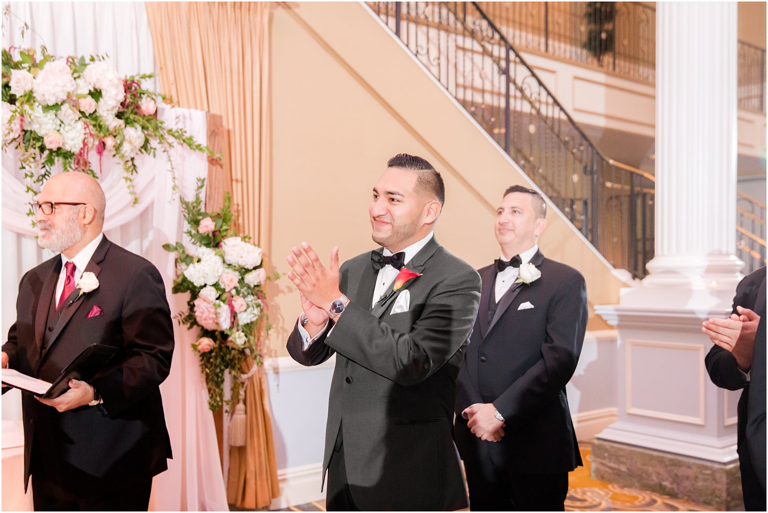 groom sees bride during wedding ceremony