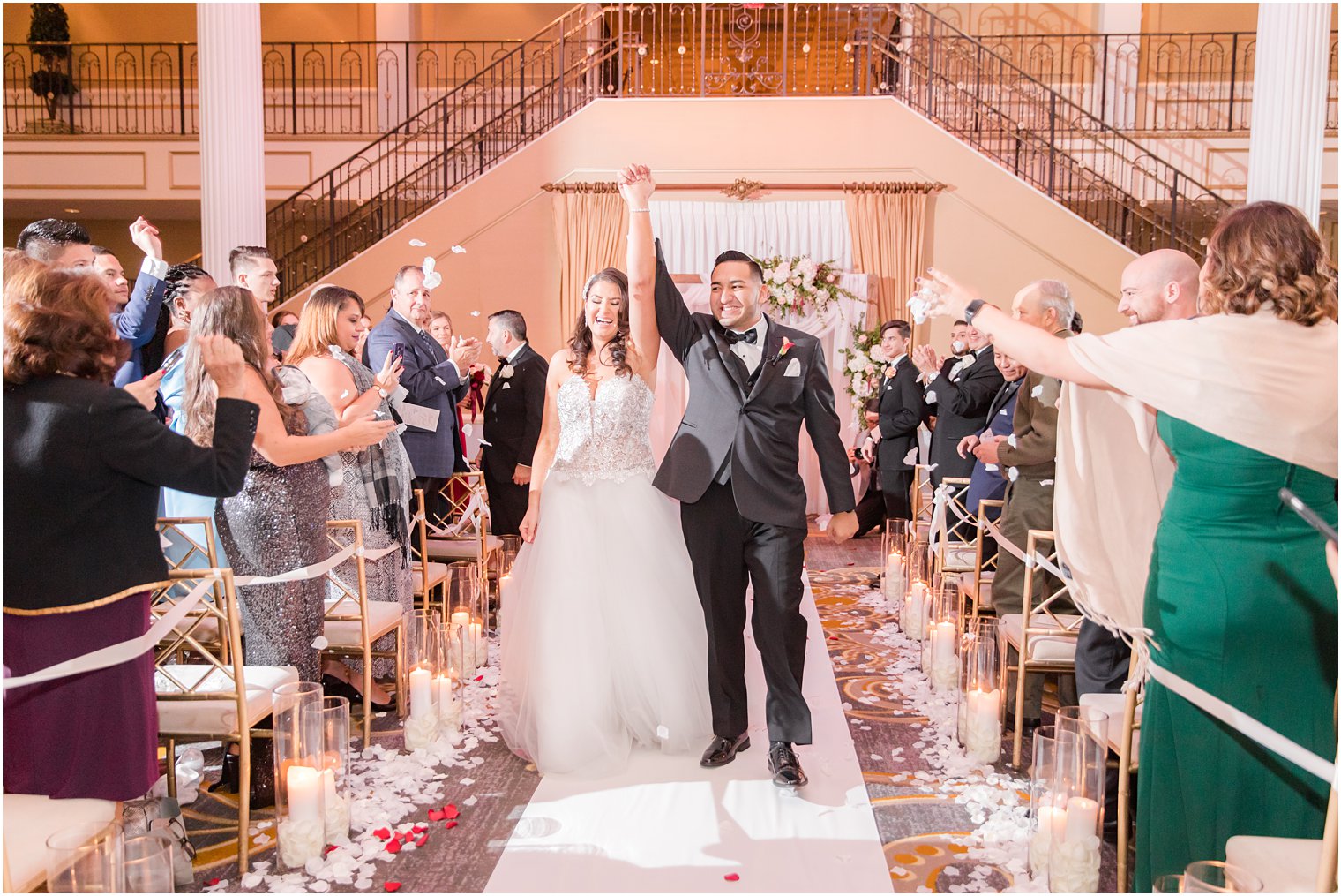 bride and groom recess up aisle at the Palace at Somerset Park