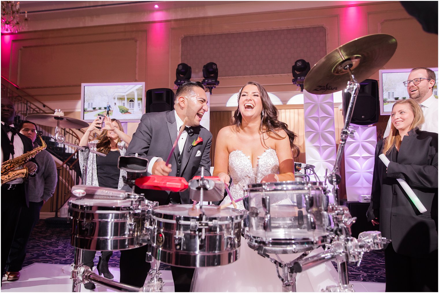 wedding reception fun with drums photographed by Idalia Photography