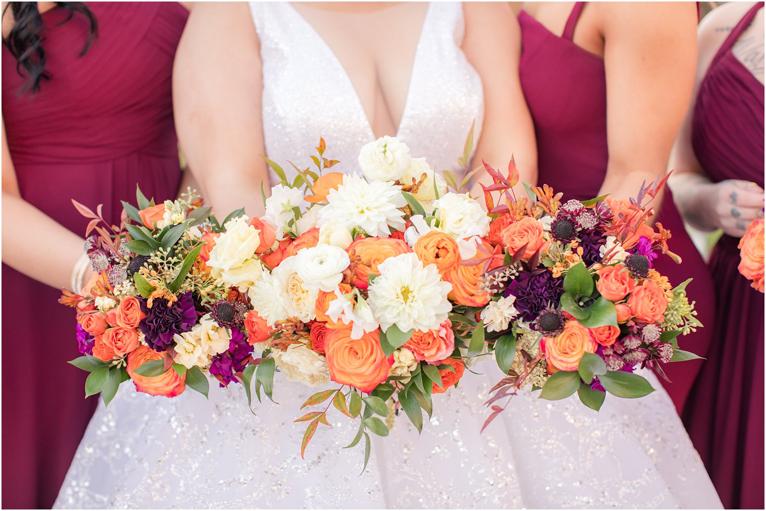 orange and purple fall flowers by Twisted Willow Flowers