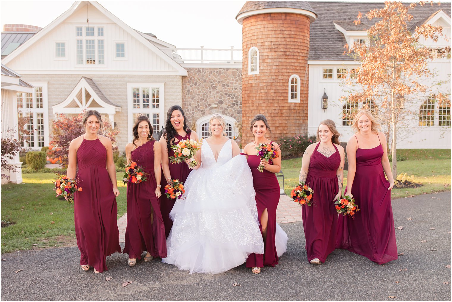 maroon bridesmaid gowns photographed by Idalia Photography