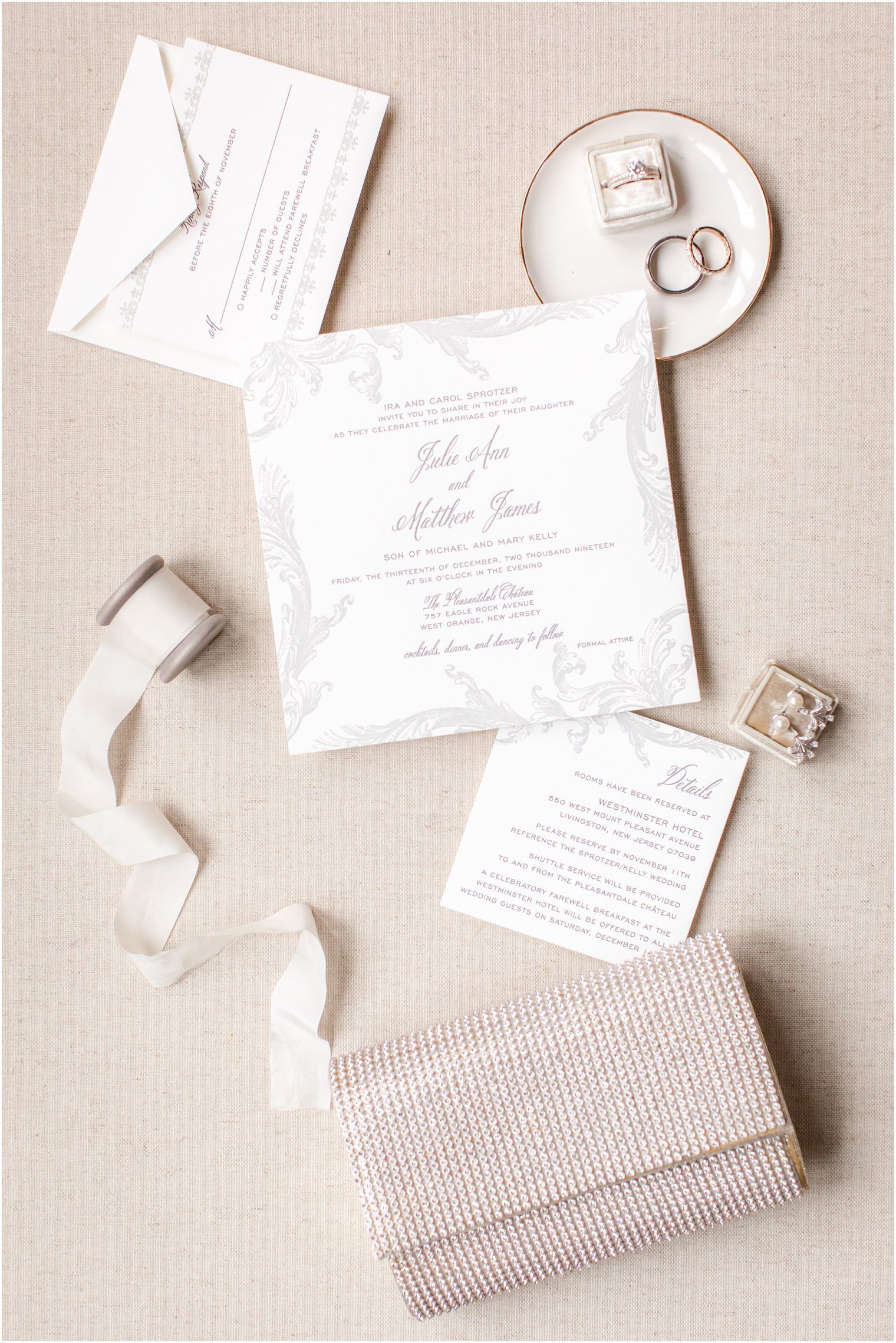 Elegant white and silver wedding invitation for a winter wedding at Pleasantdale Chateau | Photo by Idalia Photography