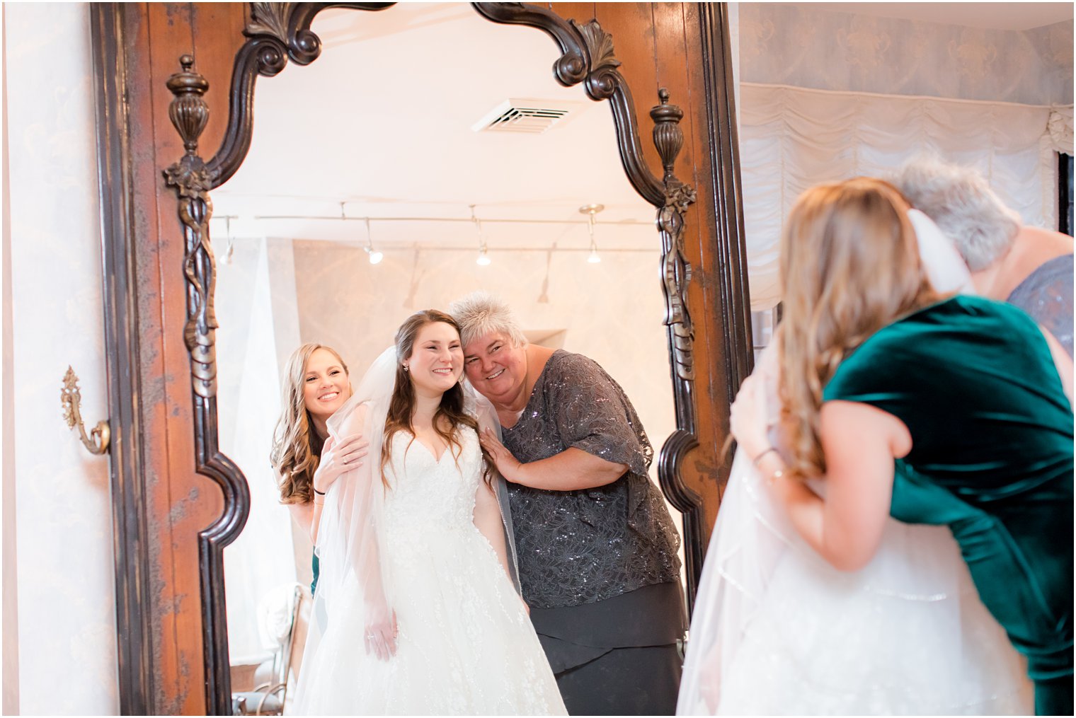 bride getting ready in Pleasantdale Chateau bridal suite 