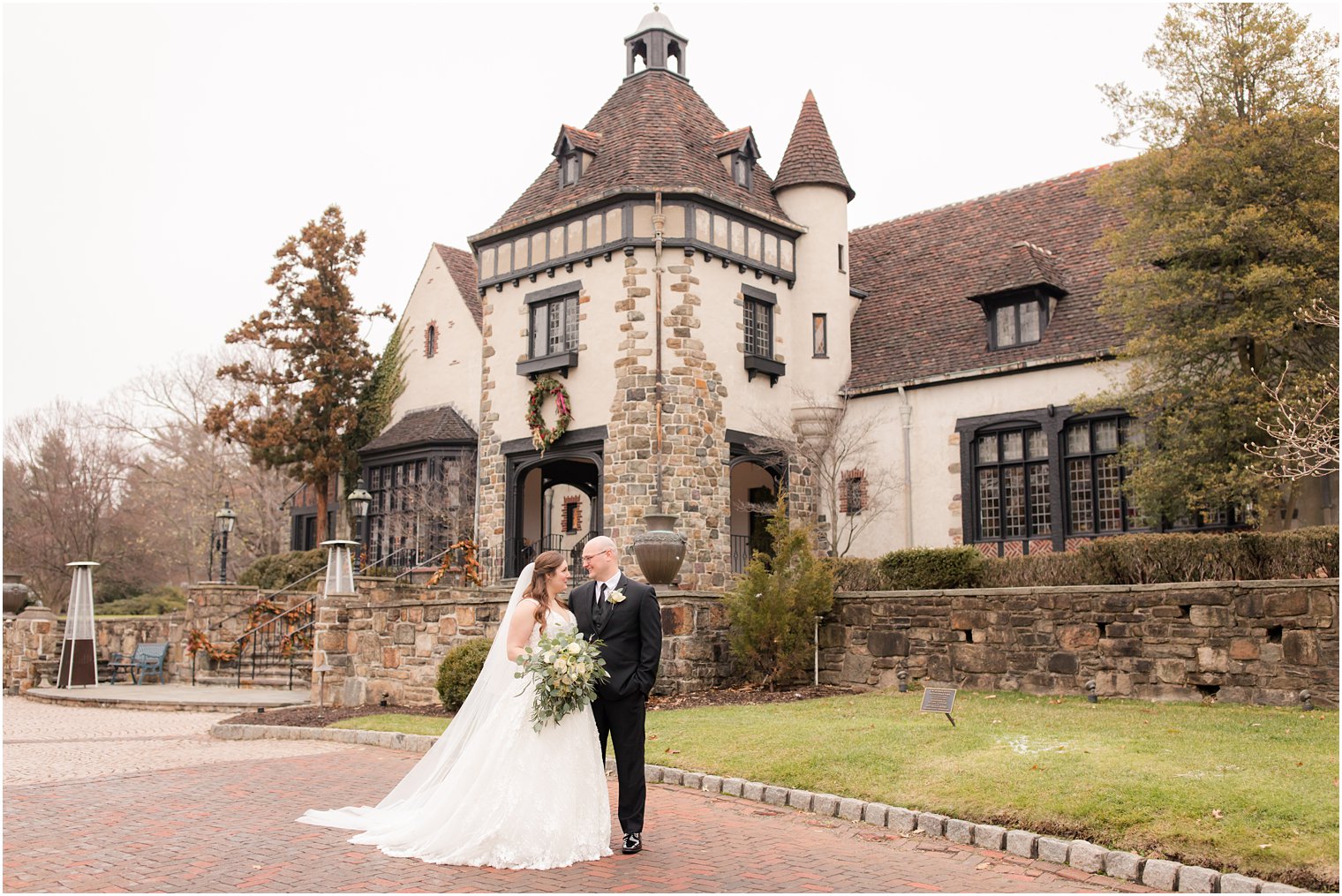 bride and groom wedding portraits at Pleasantdale Chateau winter wedding