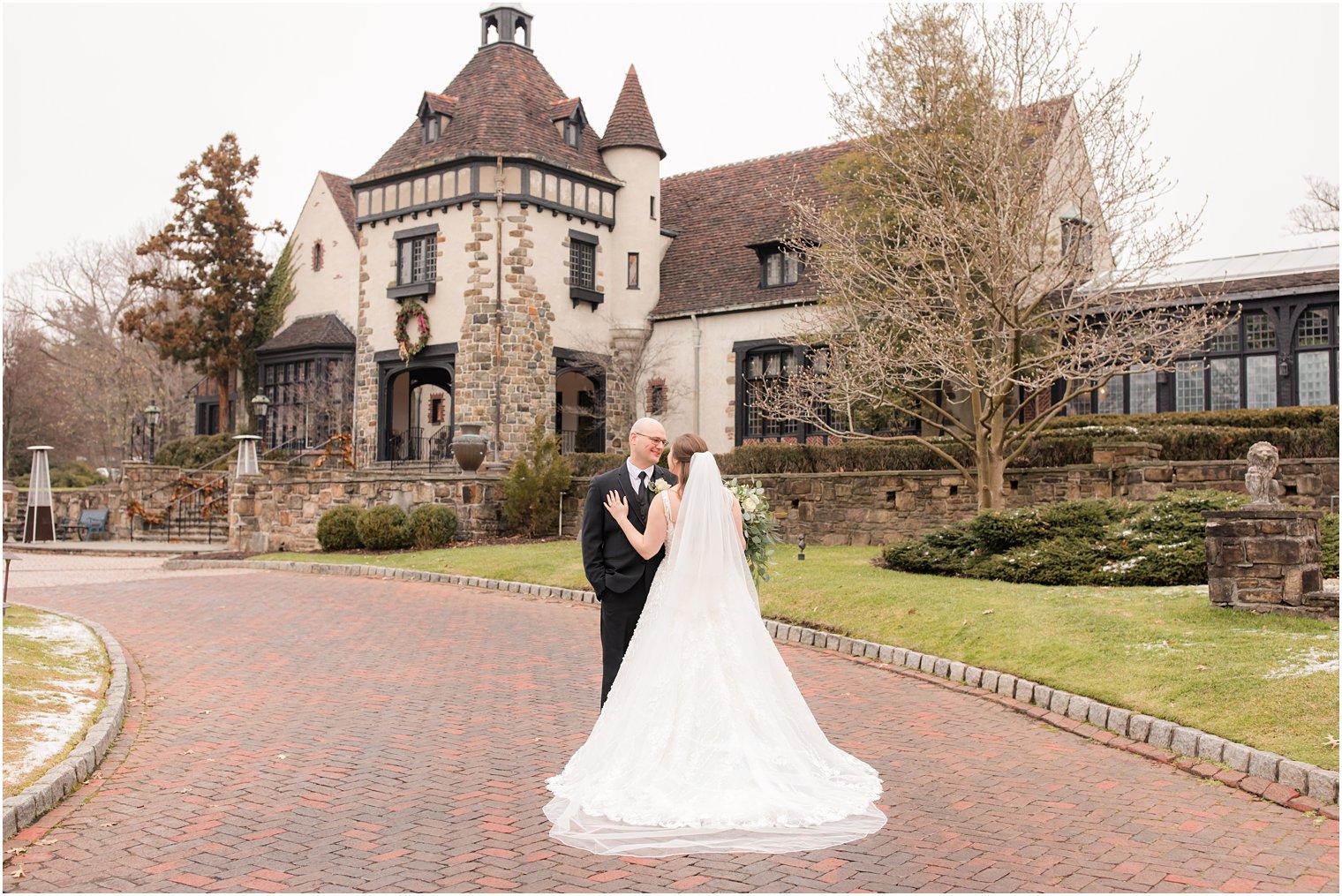 wedding portrait with bride's train at Pleasantdale Chateau winter wedding