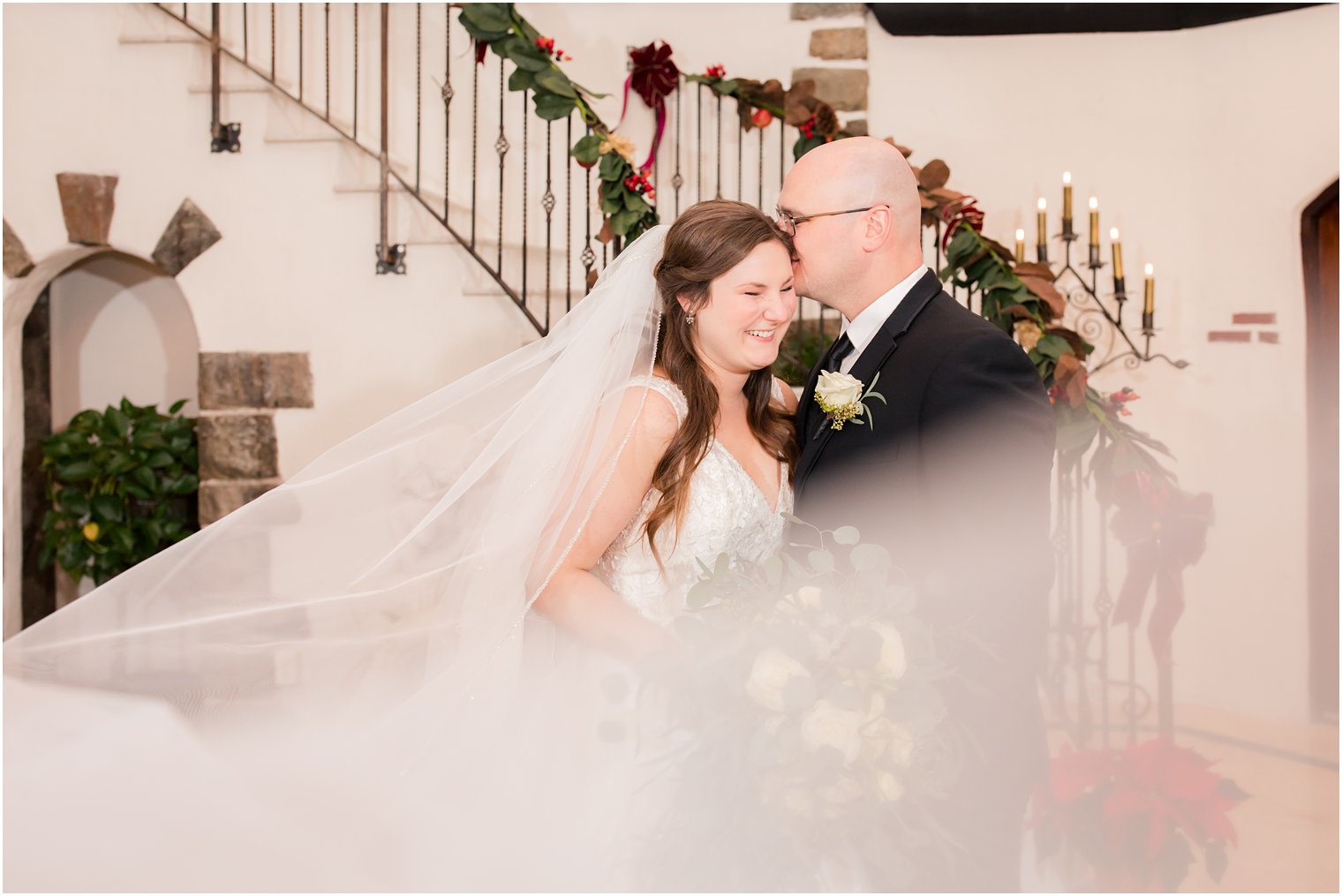 bride and groom in Pleasantdale Chateau foyer