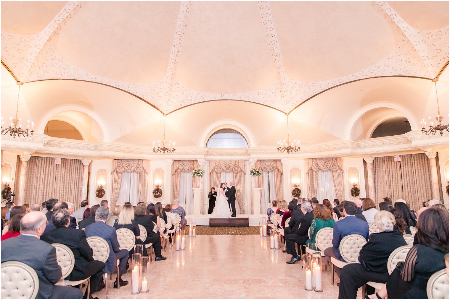 indoor wedding ceremony photo at Pleasantdale Chateau