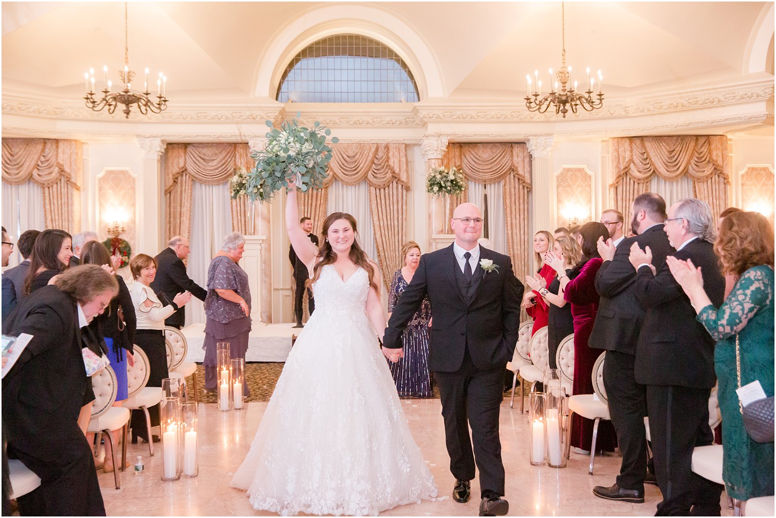 indoor wedding ceremony recessional photo at Pleasantdale Chateau