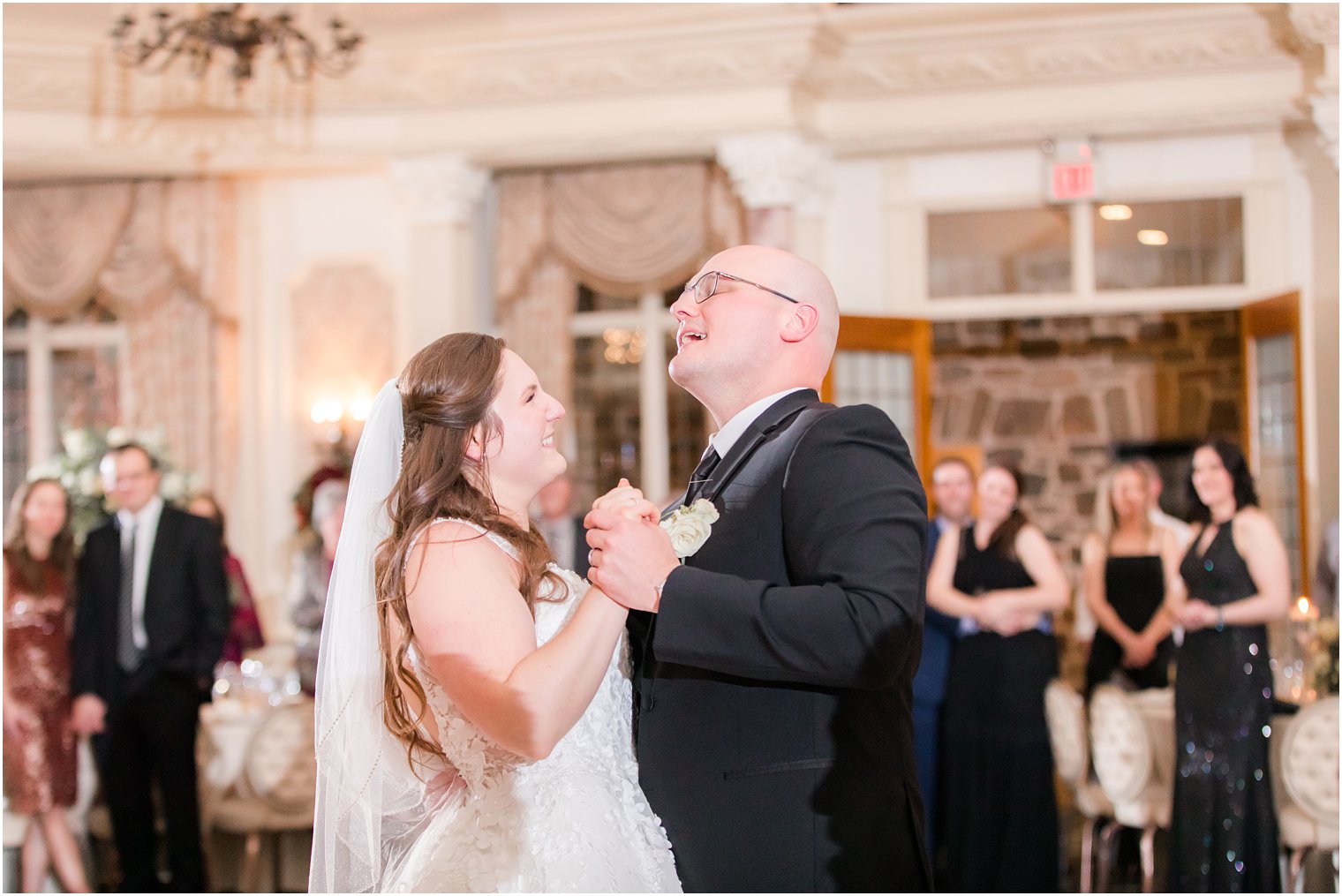 bride and groom's first dance during their wedding reception at Pleasantdale Chateau