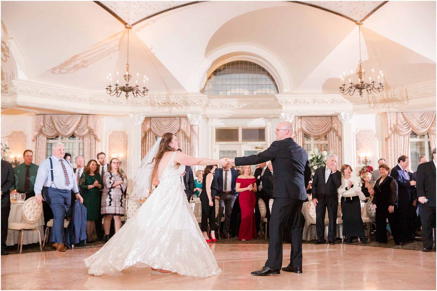 bride and groom's first dance during their wedding reception at Pleasantdale Chateau