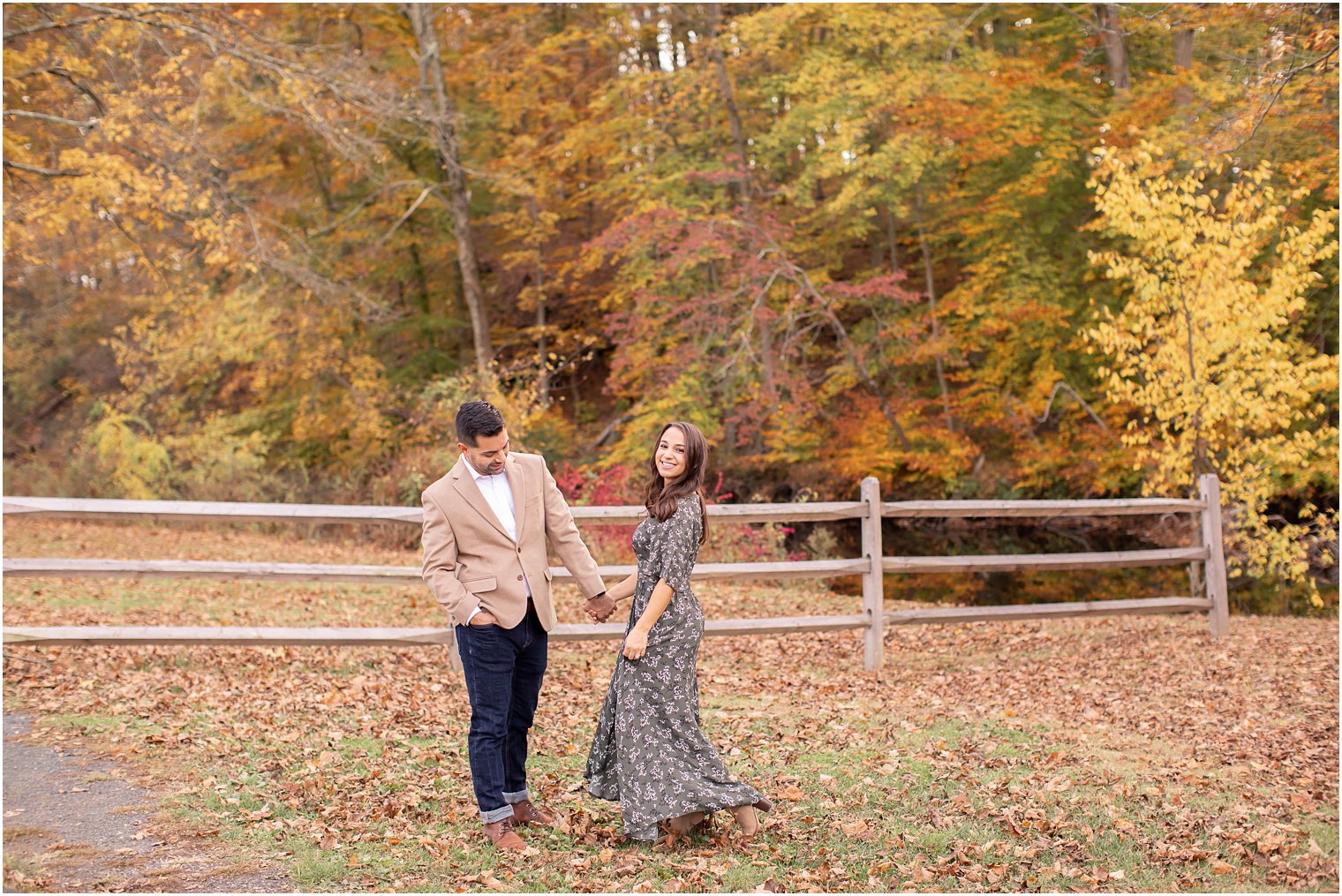 engaged couple laughing during their engagement session at Natirar Park