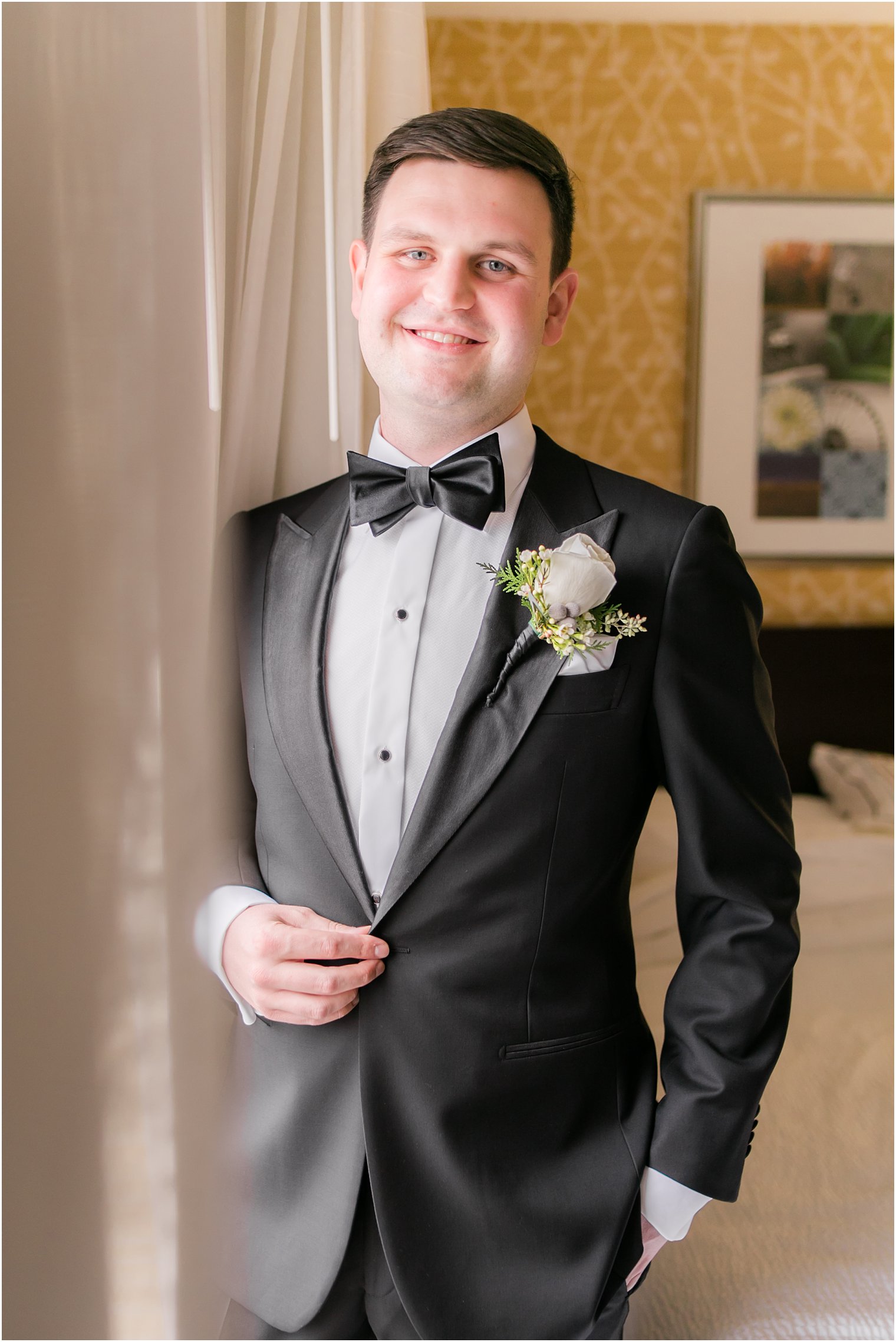 Elegant portrait of groom on wedding day