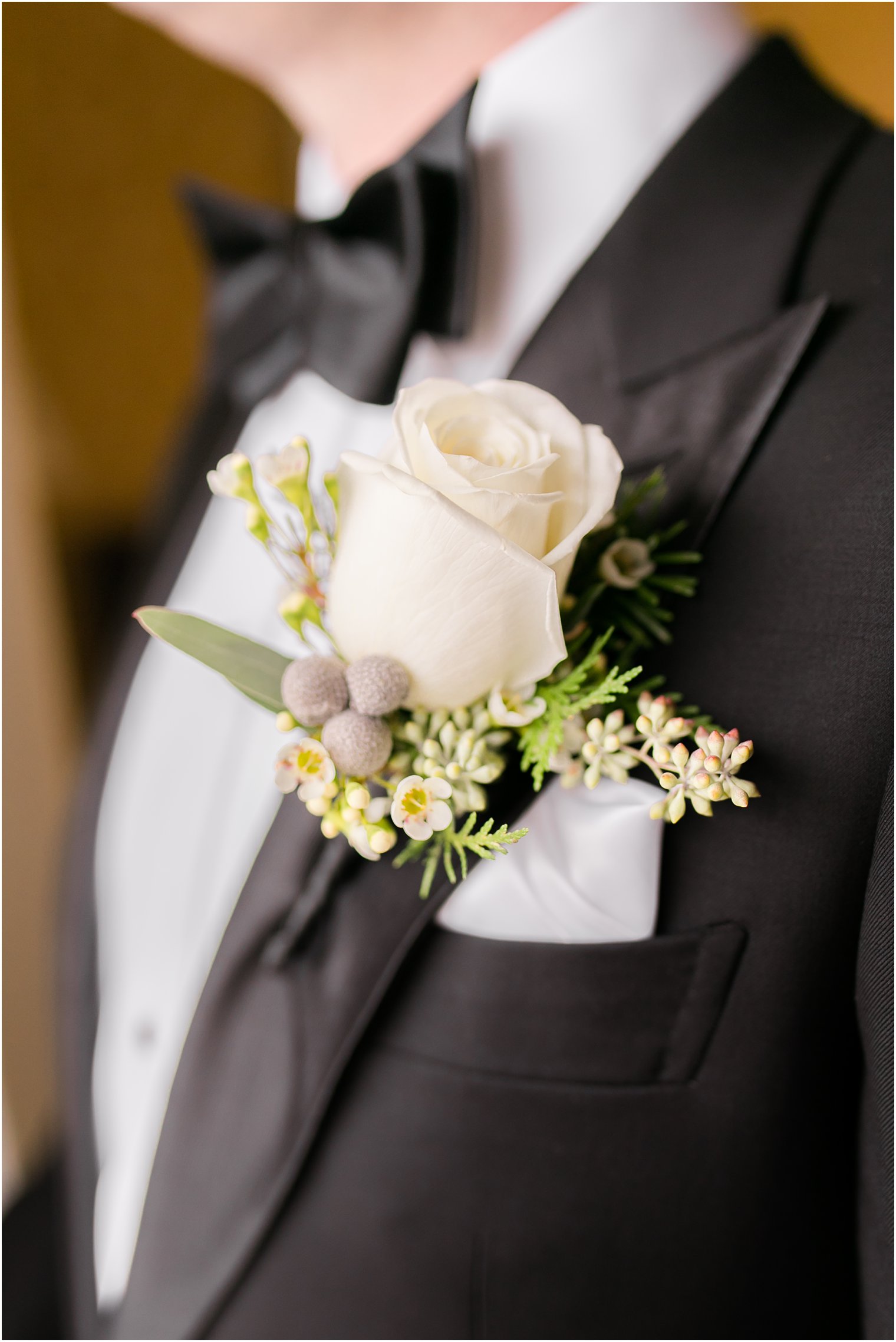 White rose boutonniere by Martinsville Florist