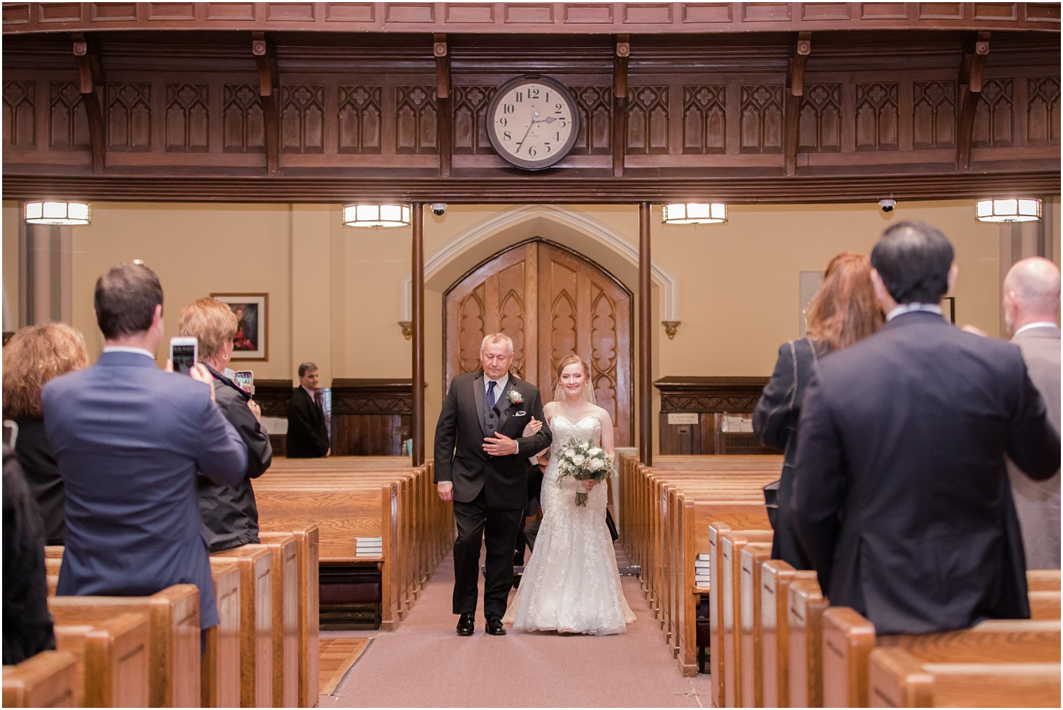 Bride walking down the aisle at St. Peter the Apostle