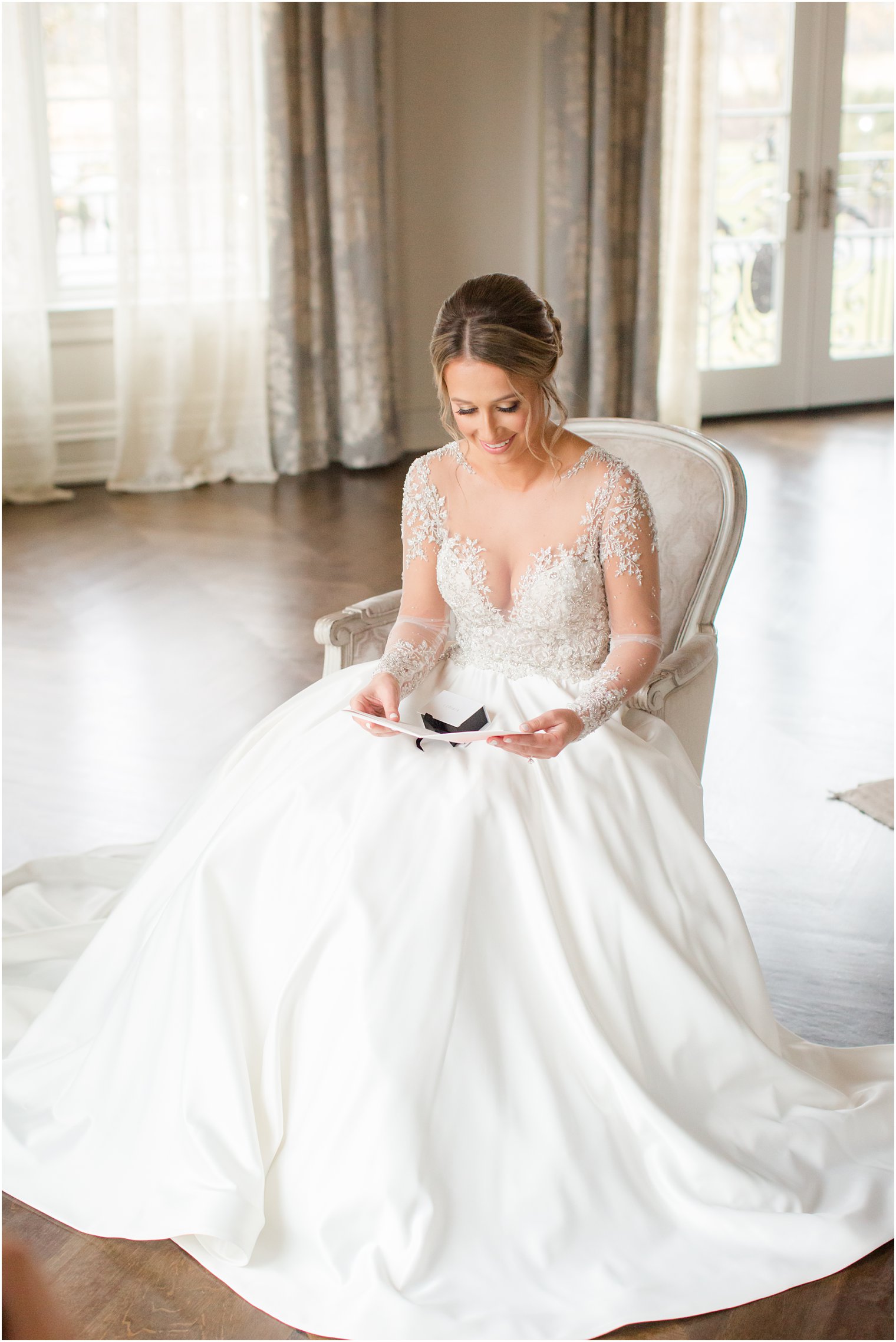 portrait of bride reading letter from her future husband