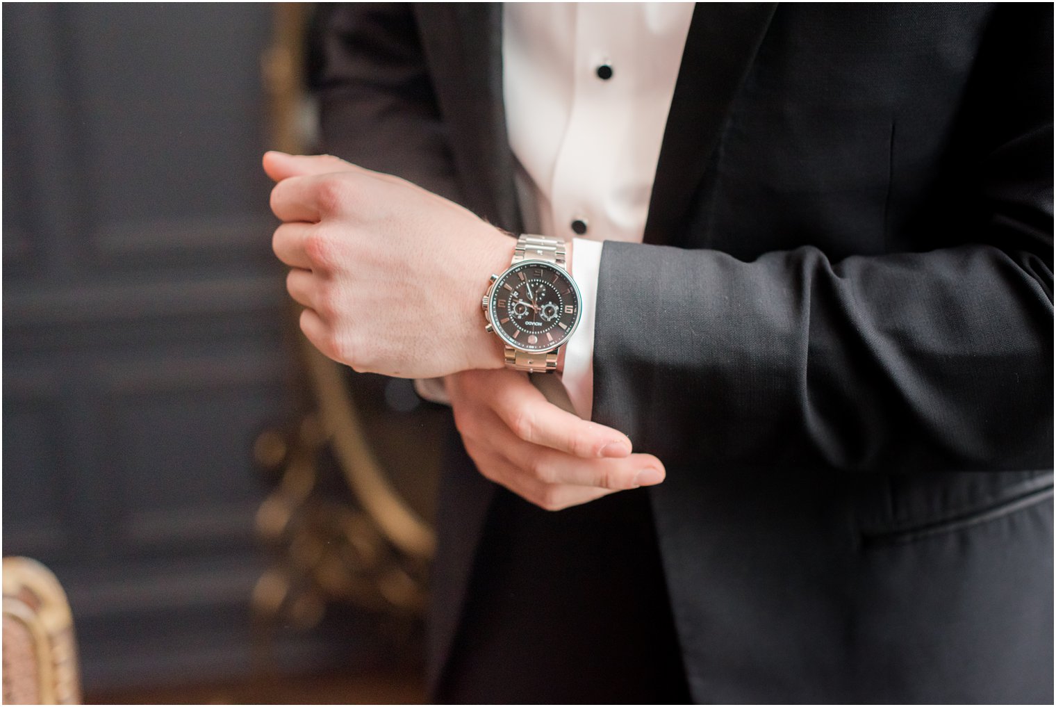 groom wearing Movado watch on wedding day