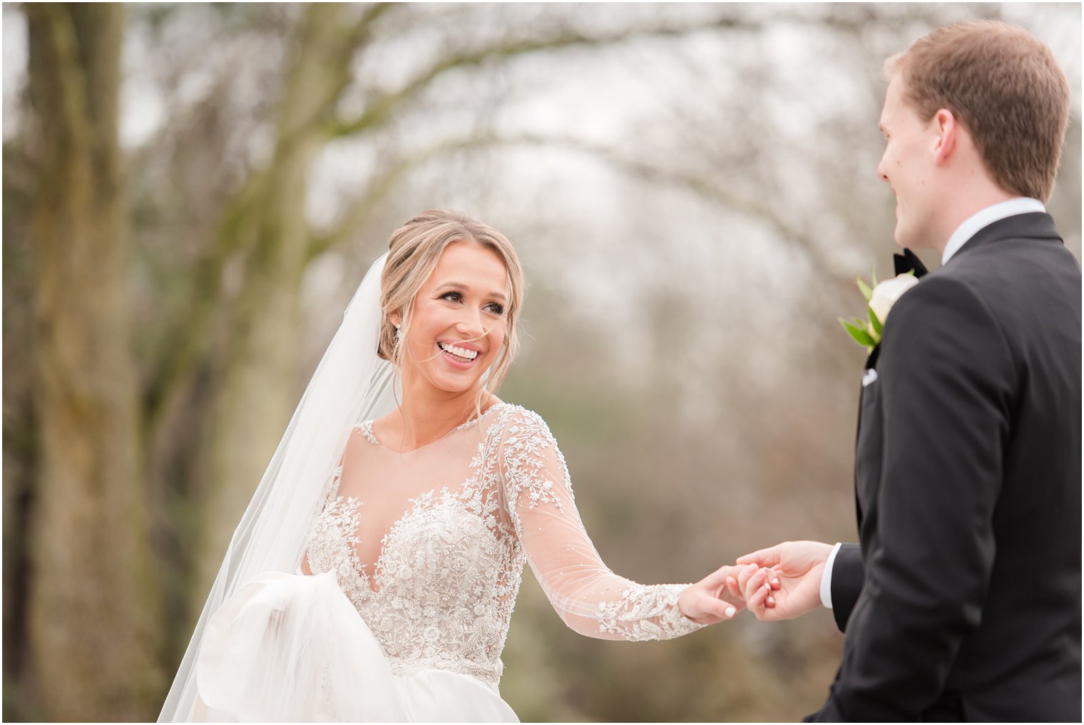 Groom twirling bride at Winter wedding at Park Chateau Estate and Gardens