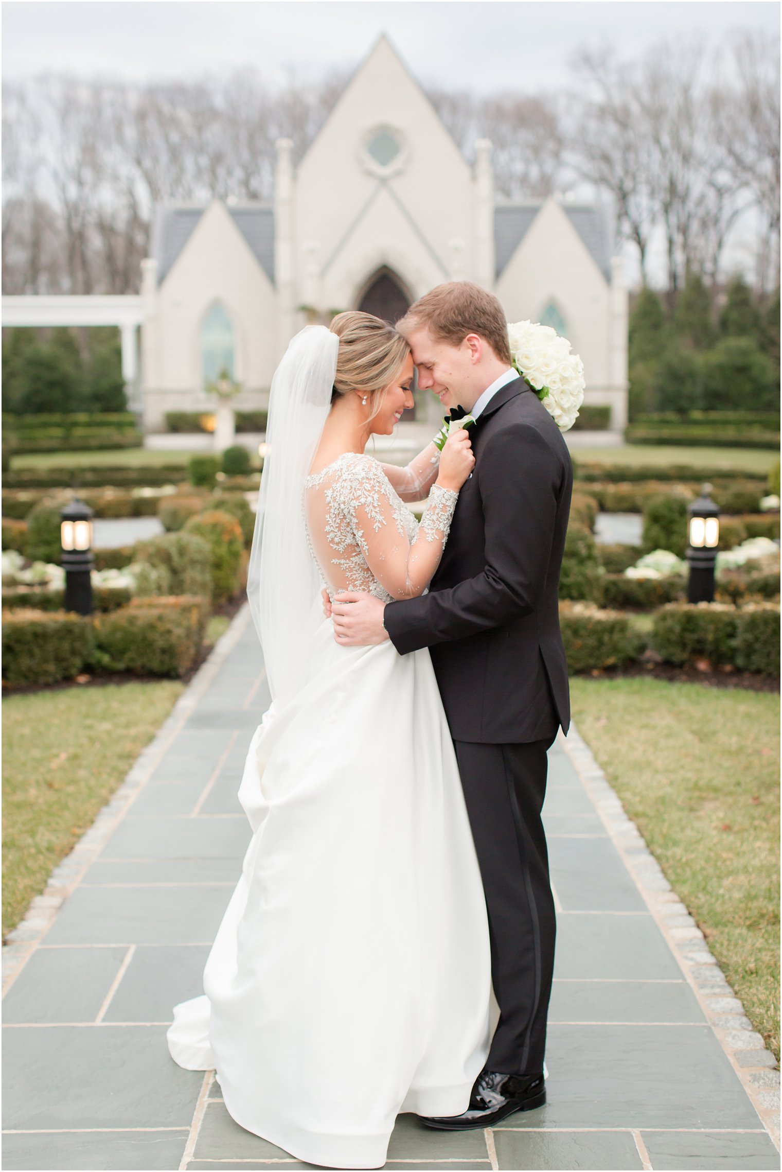 Romantic portrait of bride and groom at Park Chateau Estate and Gardens | Winter wedding by Idalia Photography Associates