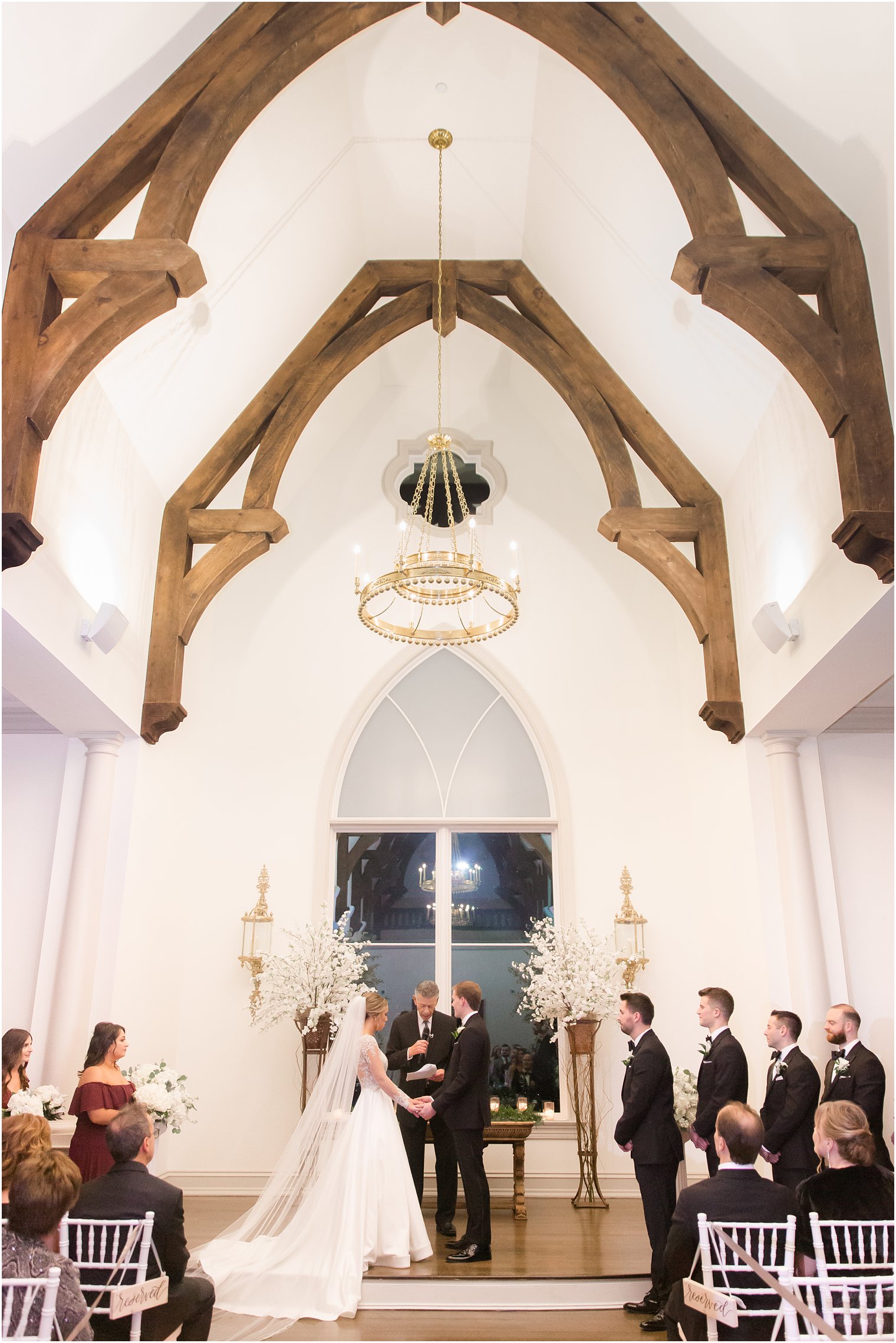 Wedding ceremony at Park Chateau Chapel| Winter wedding by Idalia Photography Associates