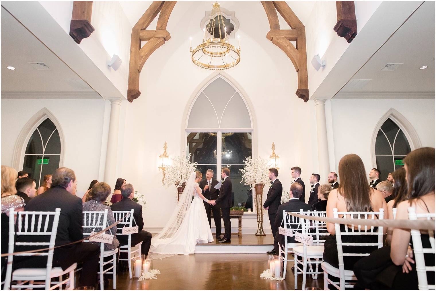 Wedding ceremony at Park Chateau Chapel| Winter wedding by Idalia Photography Associates