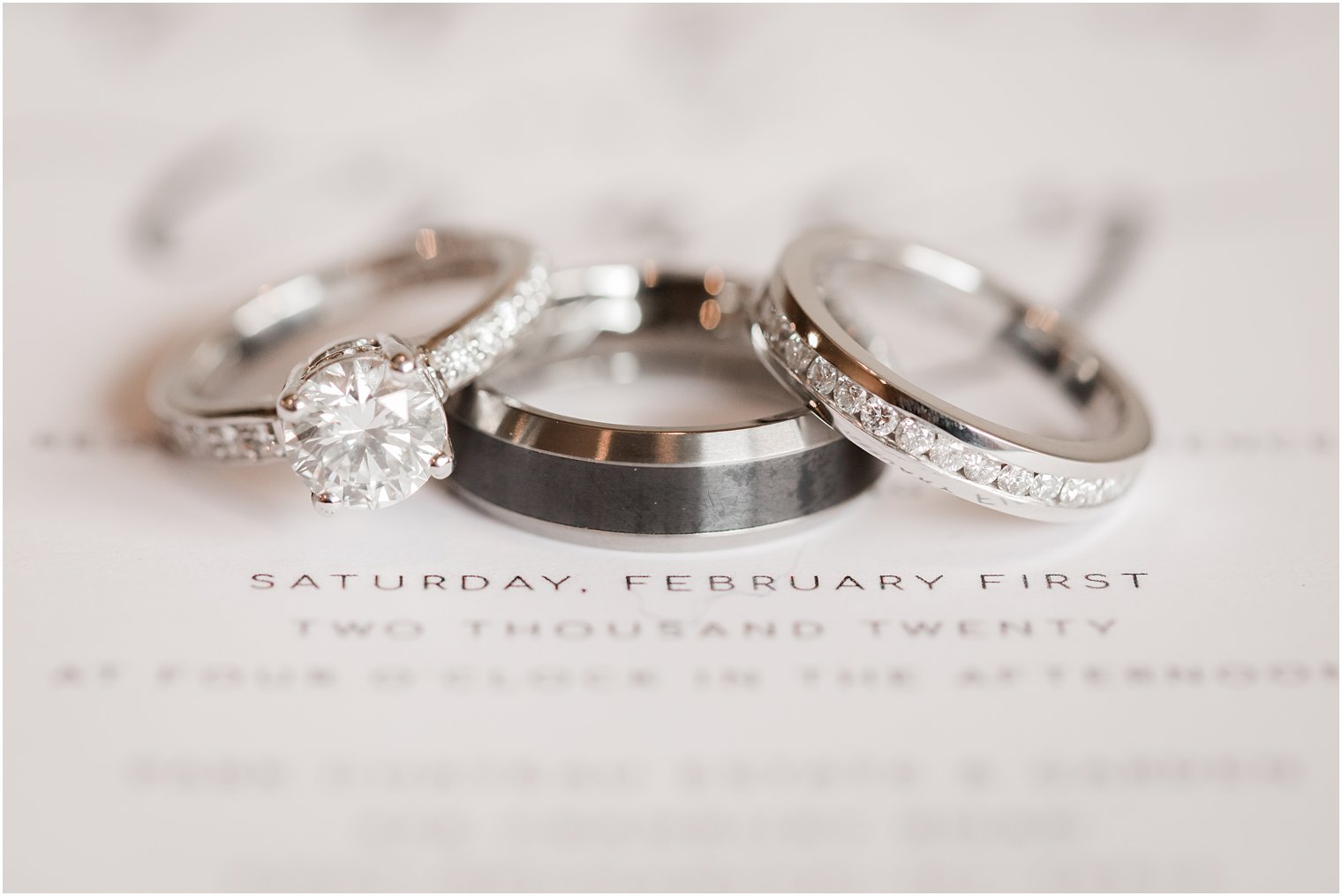 Wedding bands on invitation 