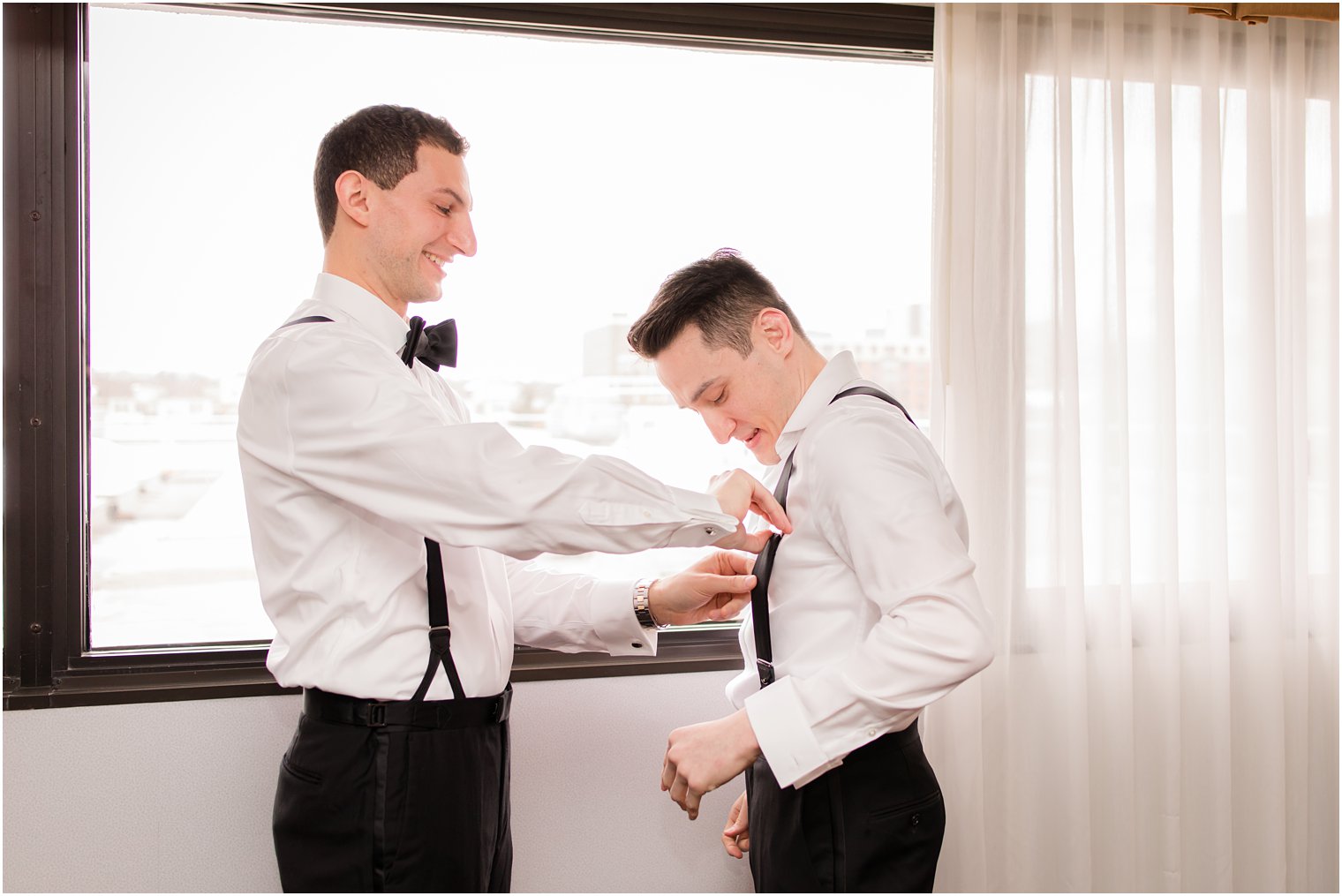 Groom getting ready with best man