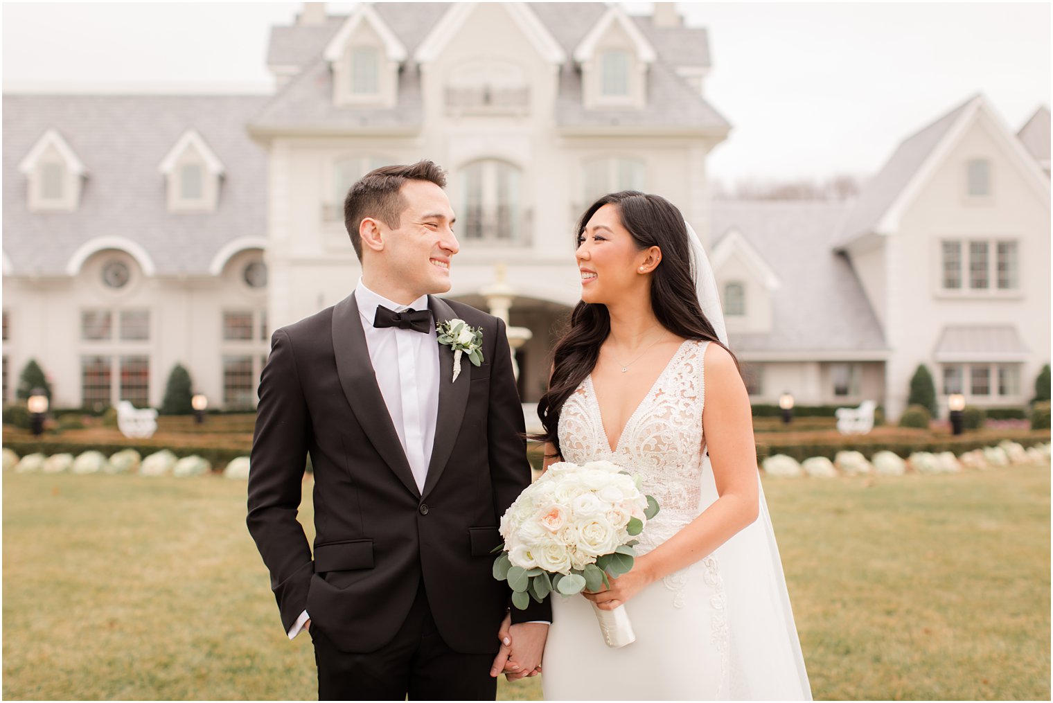 Bride and groom posing for formal portraits at Park Chateau Estate