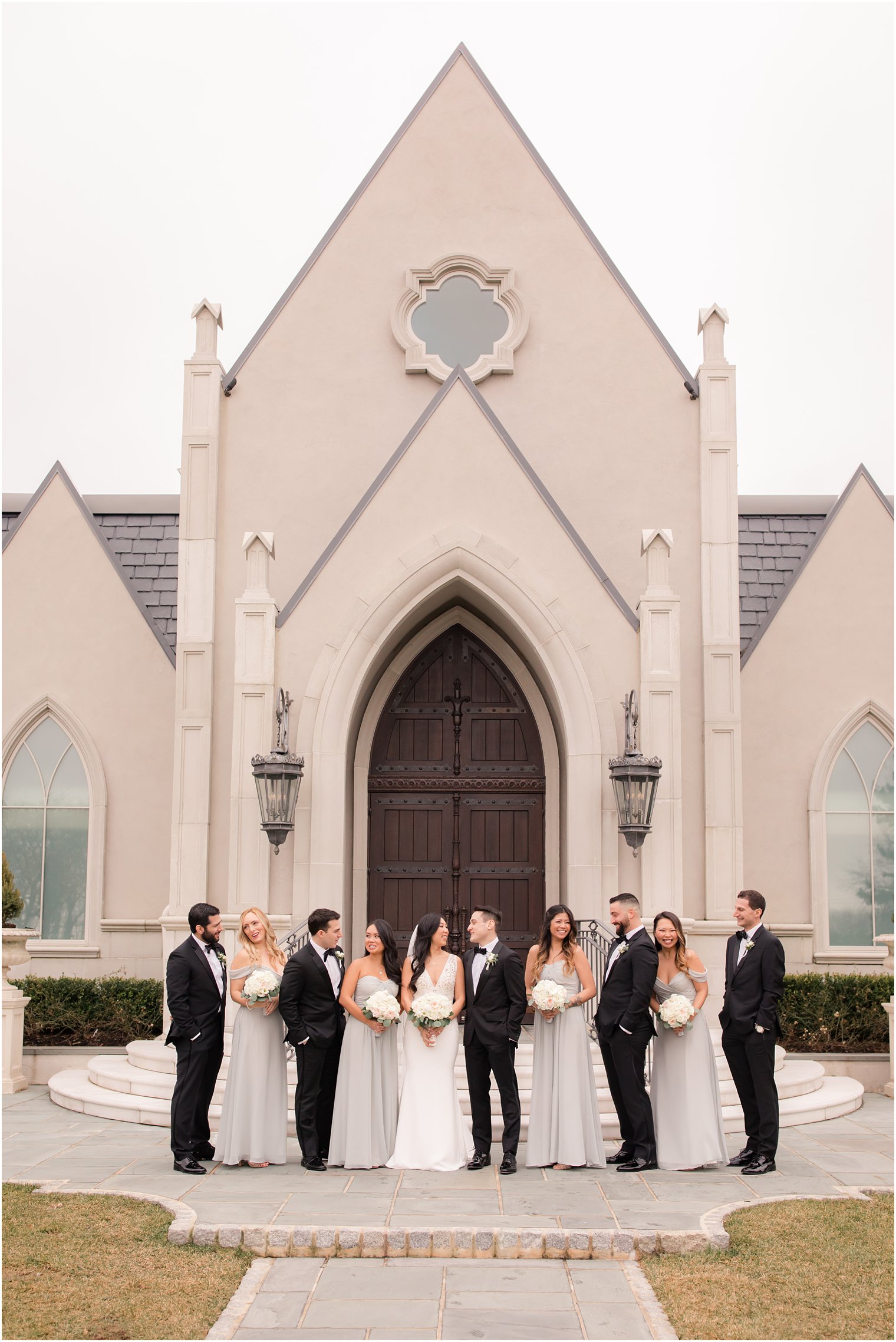 Bridal party in front of chapel