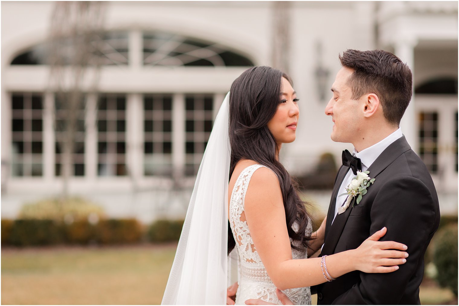 Bride and groom posing for photos at Park Chateau Estate