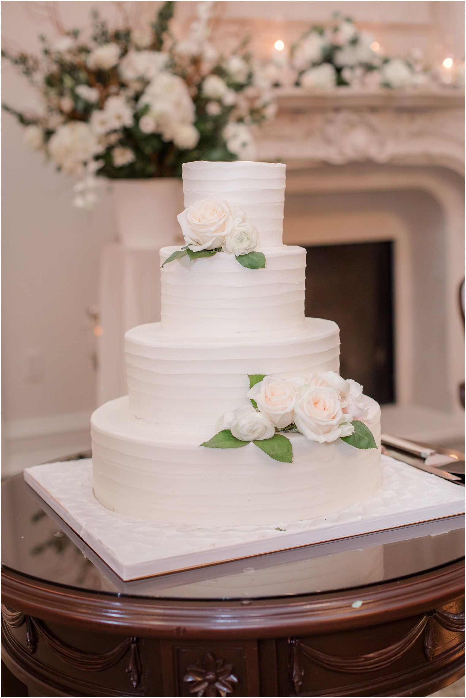 Wedding cake with greenery from Palermo's Bakery