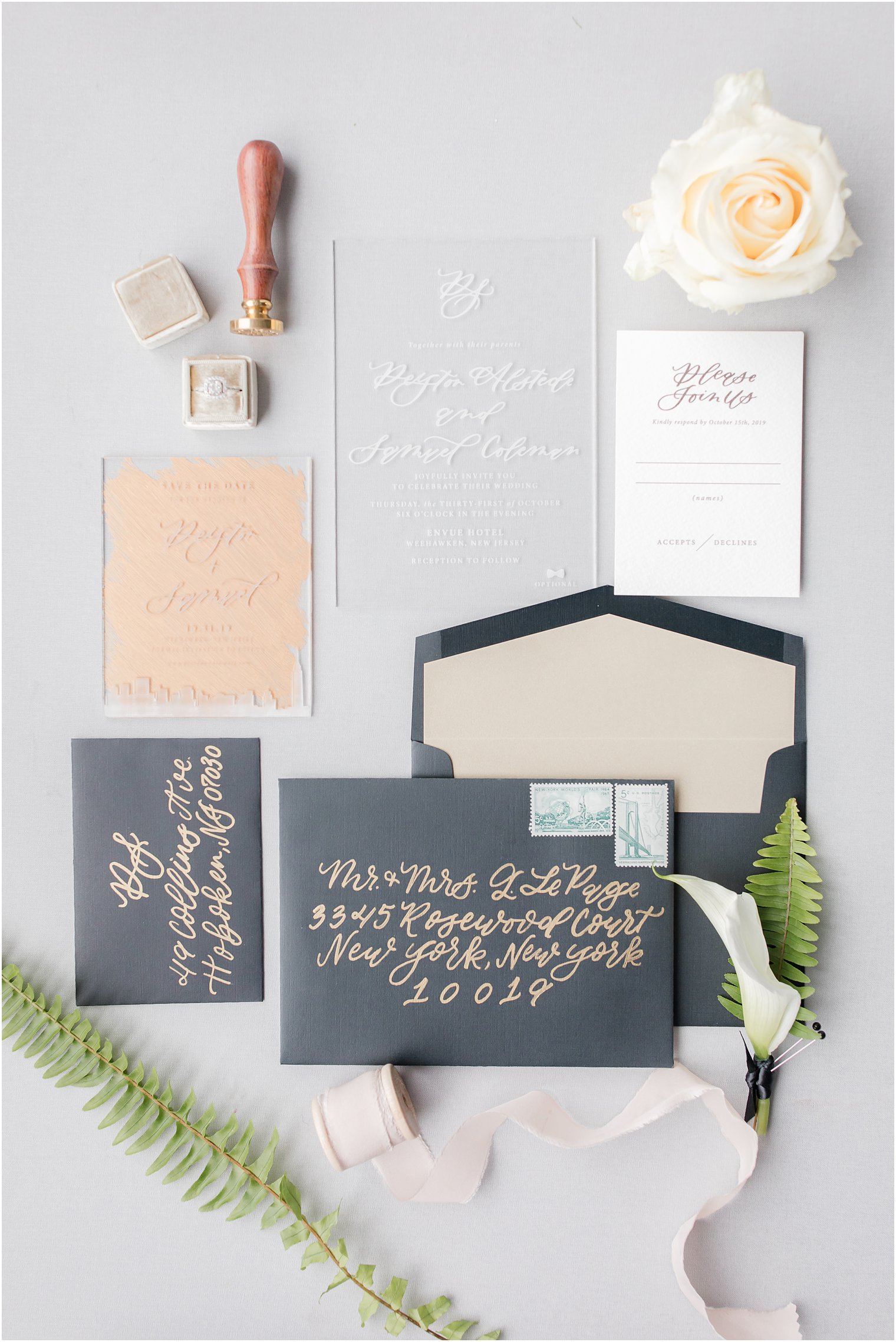 Modern wedding invitations with acrylic and gold calligraphy