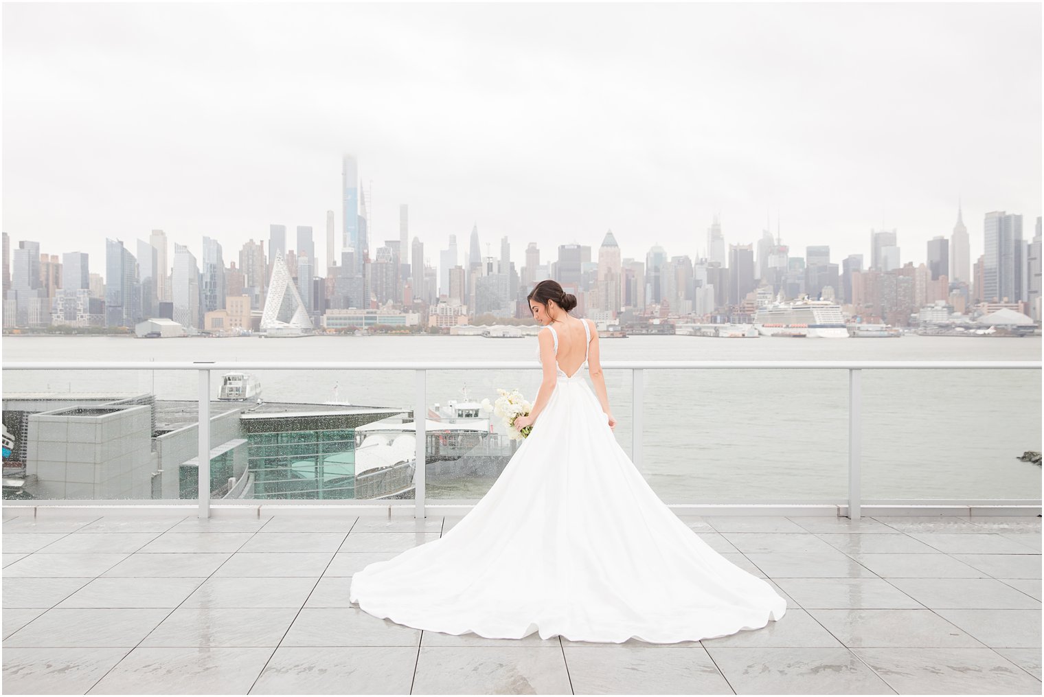 Bride in Tara Lauren dress with NYC skyline | Envue Hotel Wedding Editorial