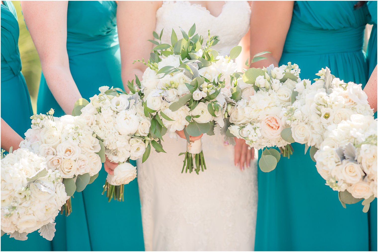 Ivory bouquets by Bloom Floral and Events