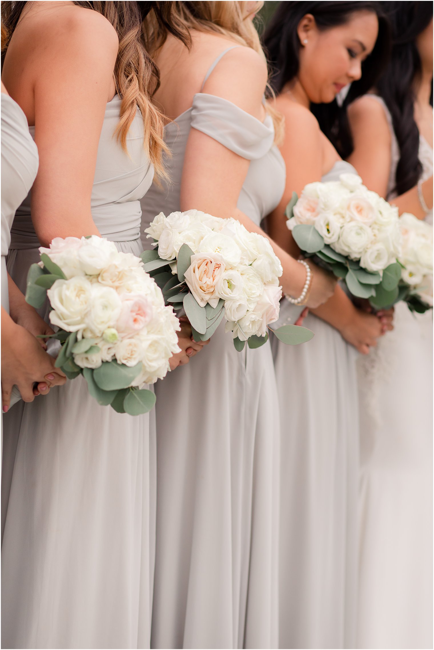 Bridesmaids bouquets by Crest Florist
