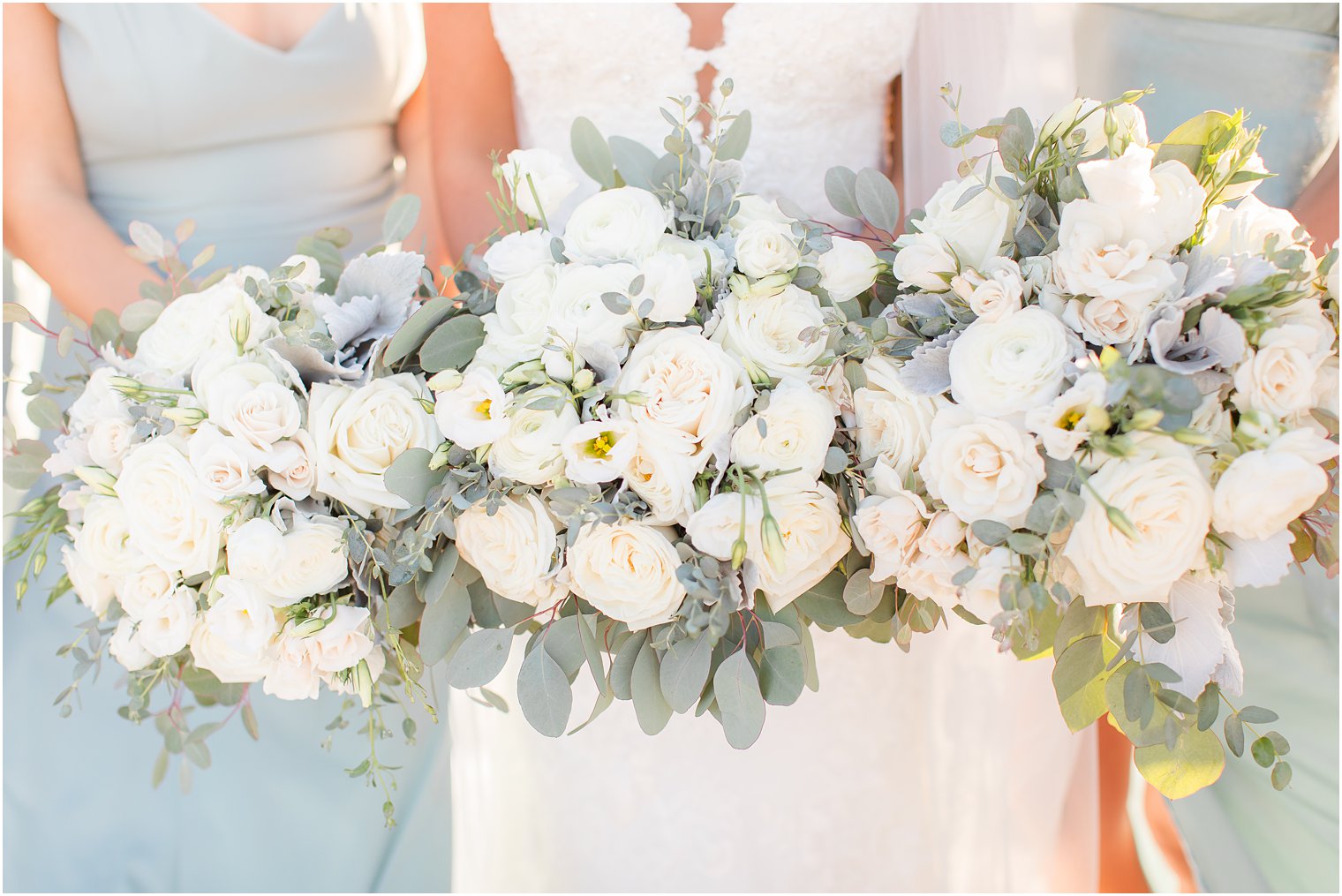 Bridesmaids bouquets by Doris the Florist