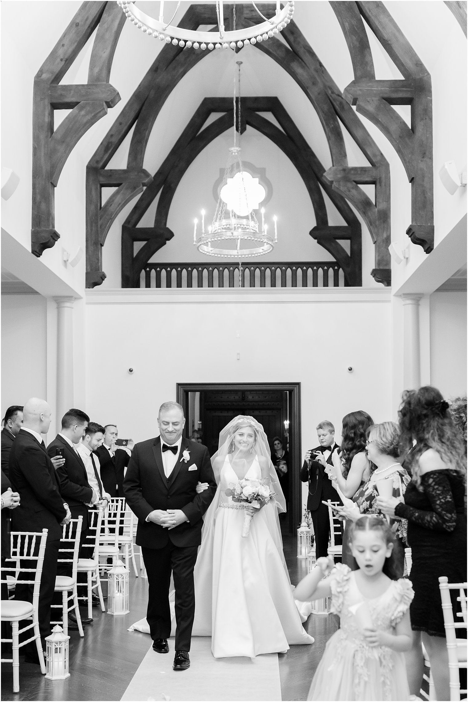 Bride walking down the aisle at Park Chateau Estate chapel 