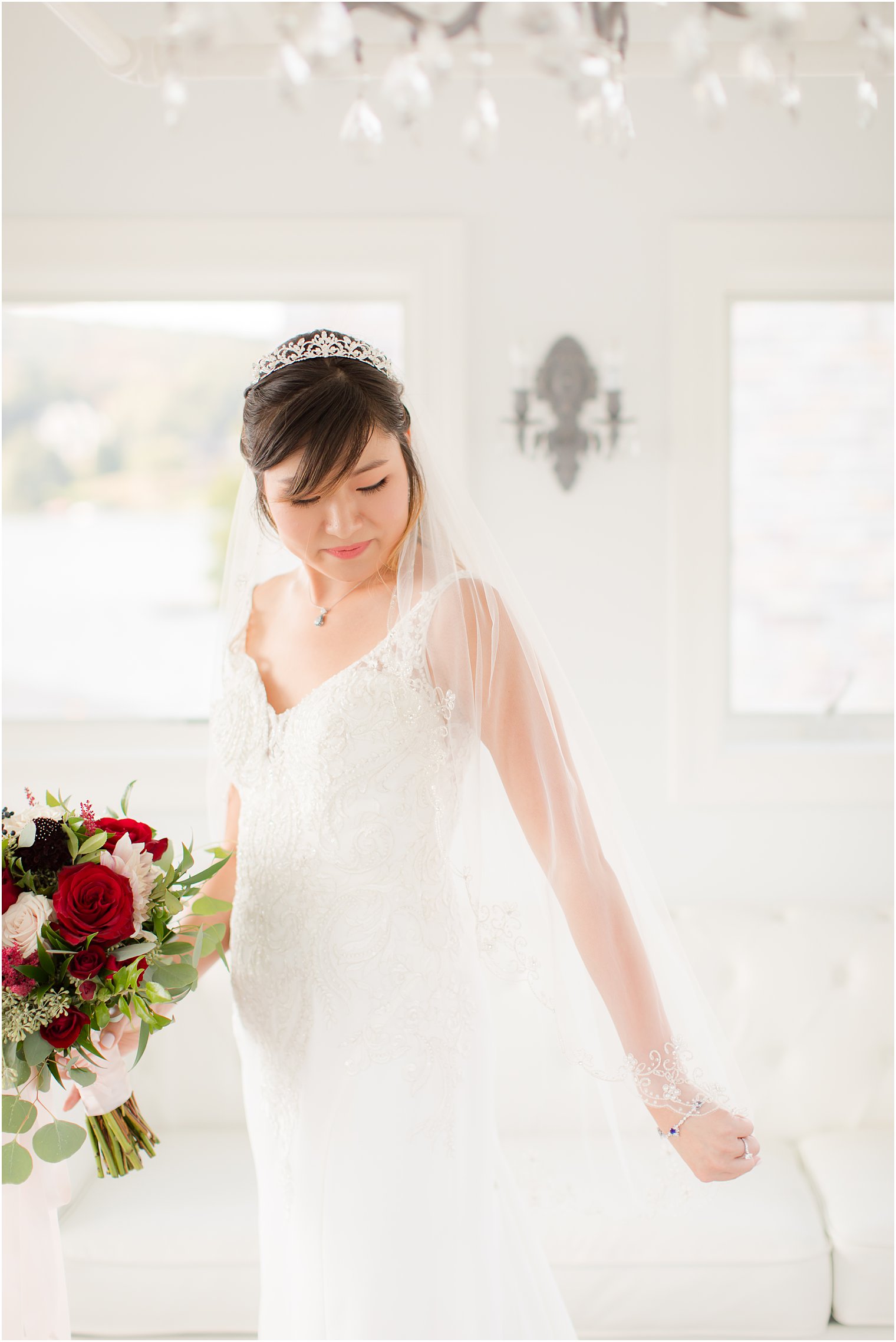 Bride showing off her veil at Lake Mohawk Country Club wedding