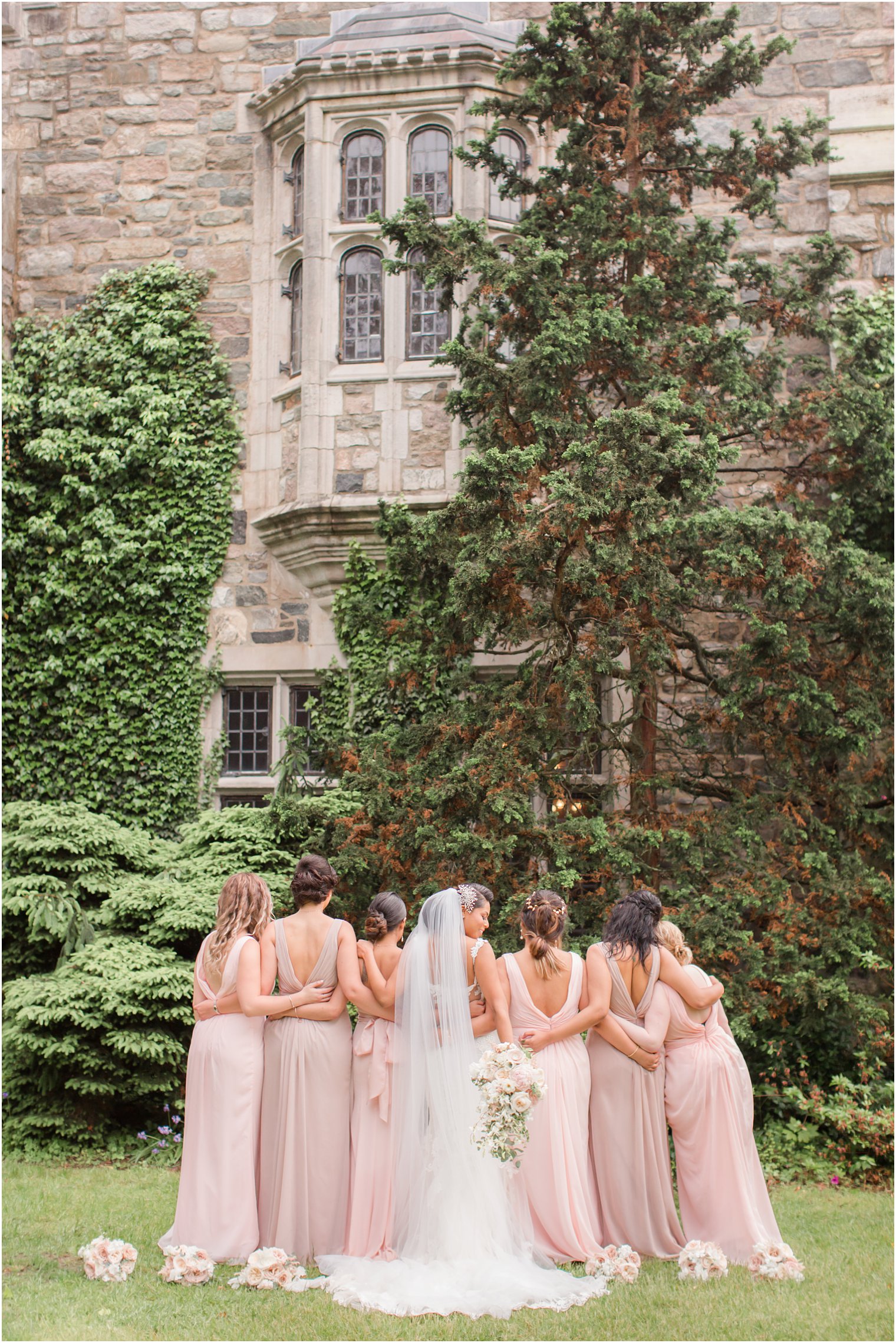 Bridesmaids taking photos at Skylands Manor in Ringwood, NJ