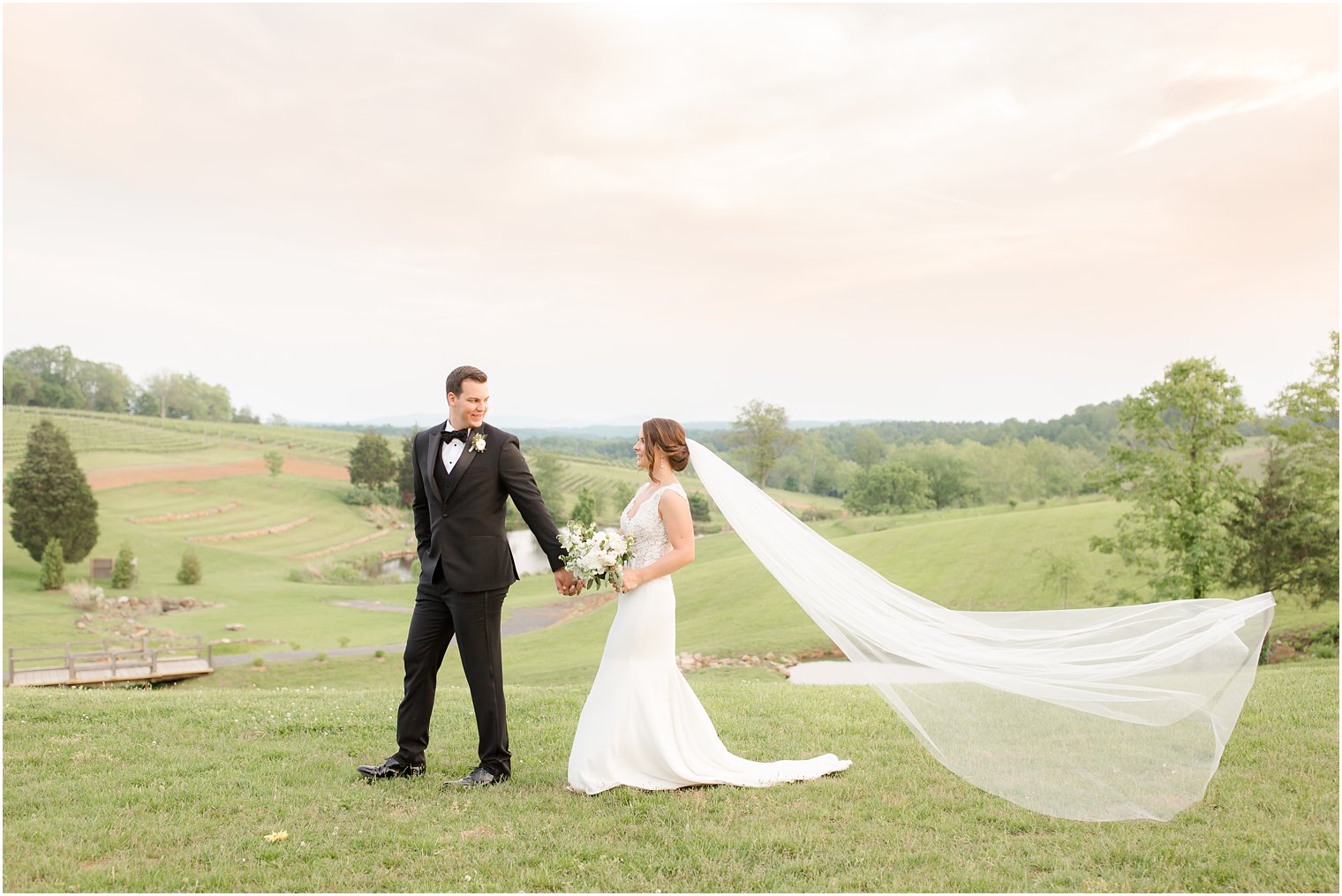 Bride and groom at sunset at Stone Tower Winery