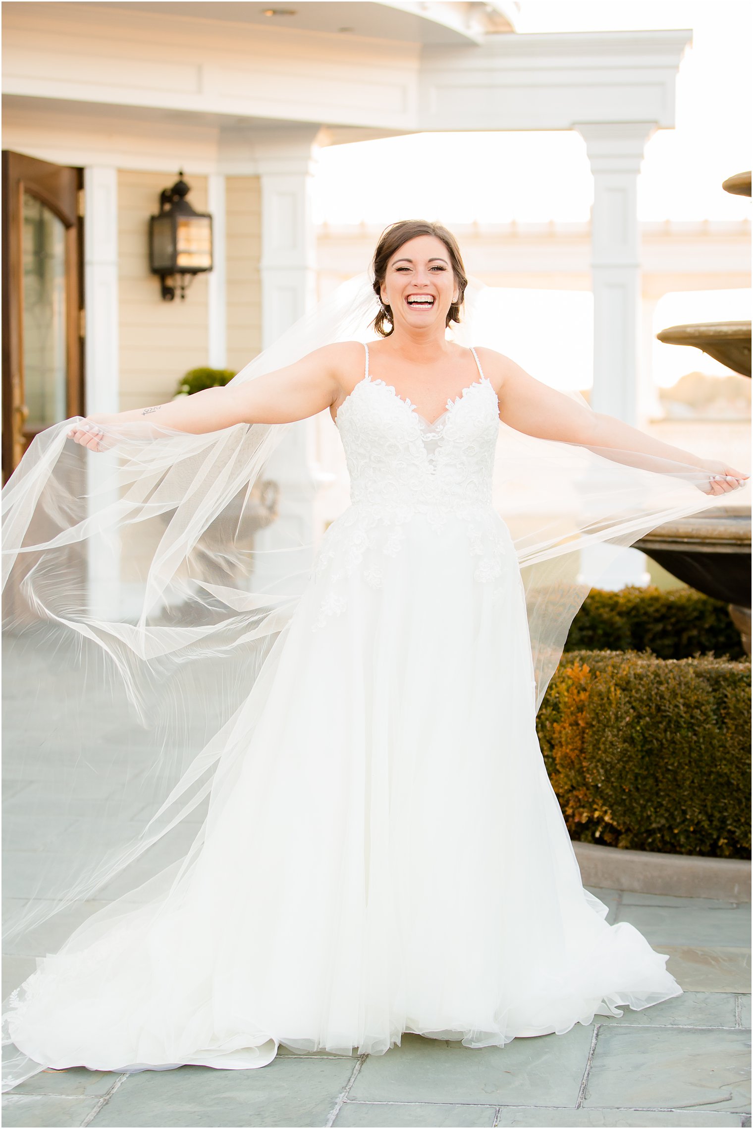 Bride's veil being blown away by the wind