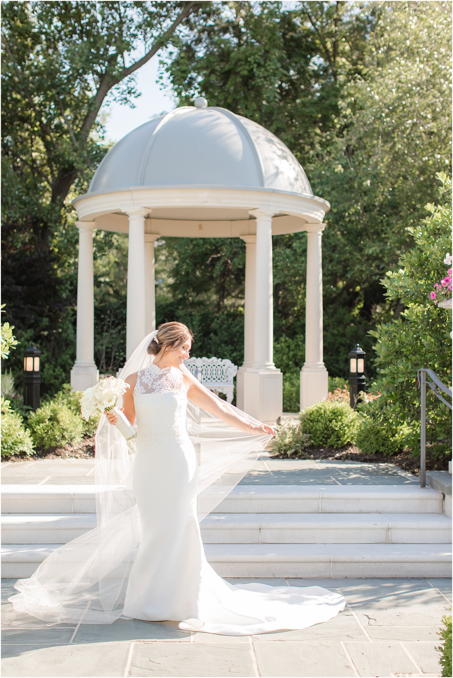 Bride posing during windy day wedding at Park Chateau Estate