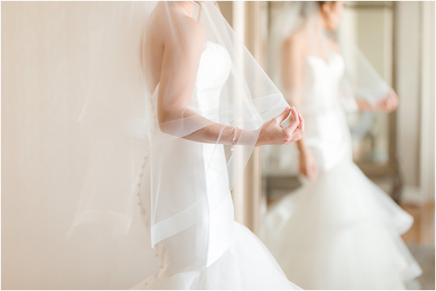 Bride with fingertip veil 