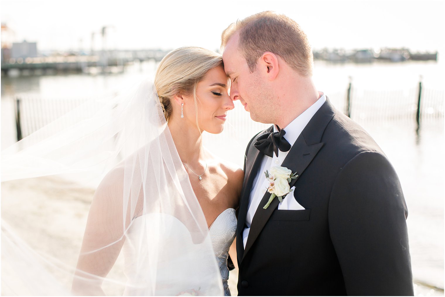 Quiet moment between bride and groom at Brant Beach Yacht Club